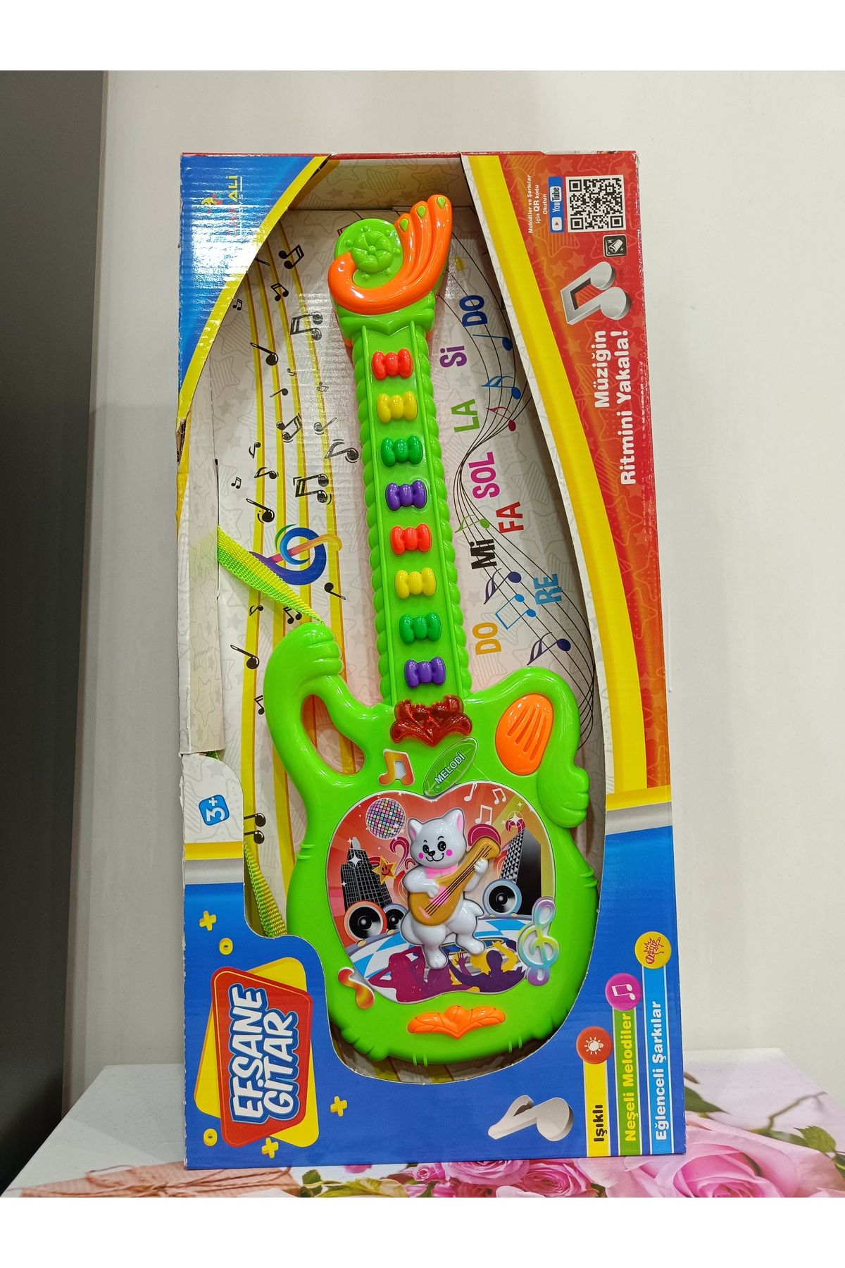 Tchibo toy guitar on sale
