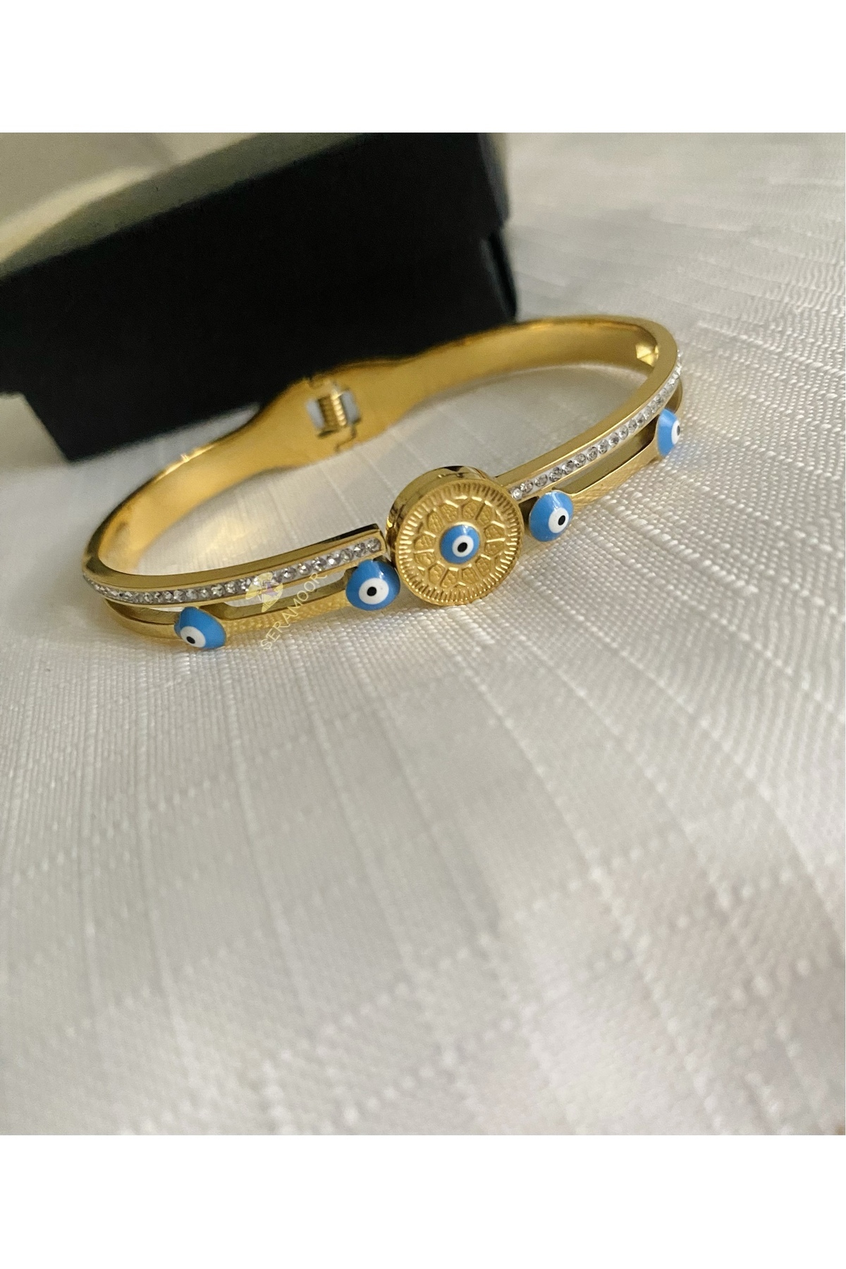 Evil eye non-darkening bracelet with steel stone