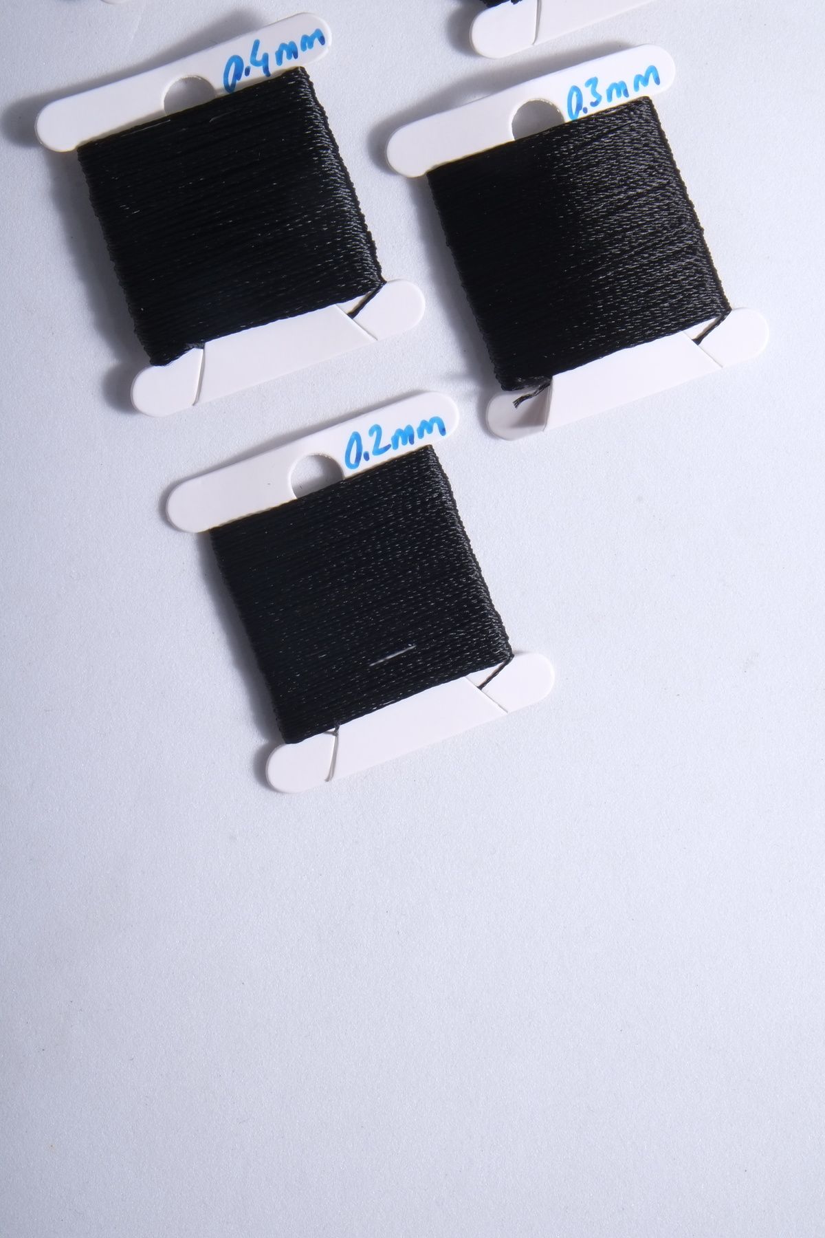 10 Metre 7 Ölçü Tesbih Ipi Seti 0.2 Mm 0.3 Mm 0.4 Mm 0.5 Mm 0.6 Mm 0.8 Mm 1 Mm Siyah Toplam 70 Metre