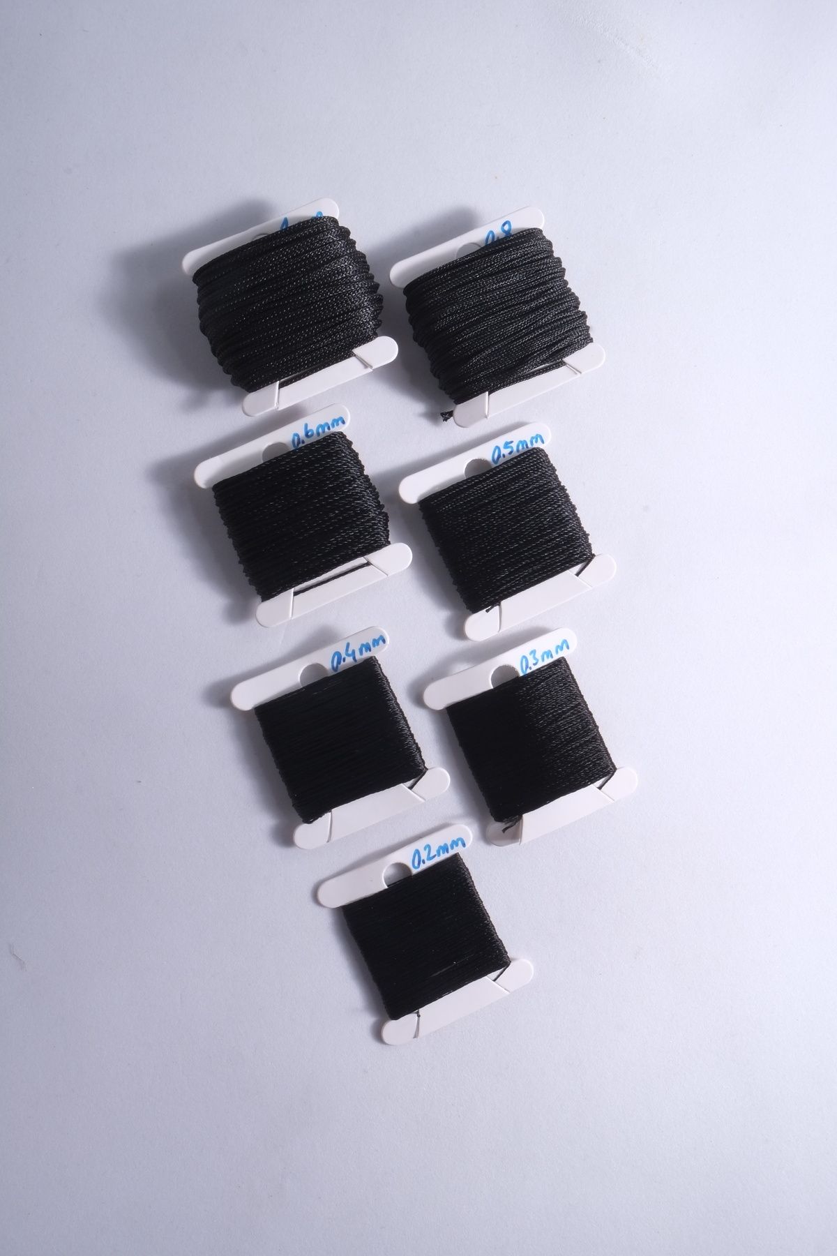 10 Metre 7 Ölçü Tesbih Ipi Seti 0.2 Mm 0.3 Mm 0.4 Mm 0.5 Mm 0.6 Mm 0.8 Mm 1 Mm Siyah Toplam 70 Metre