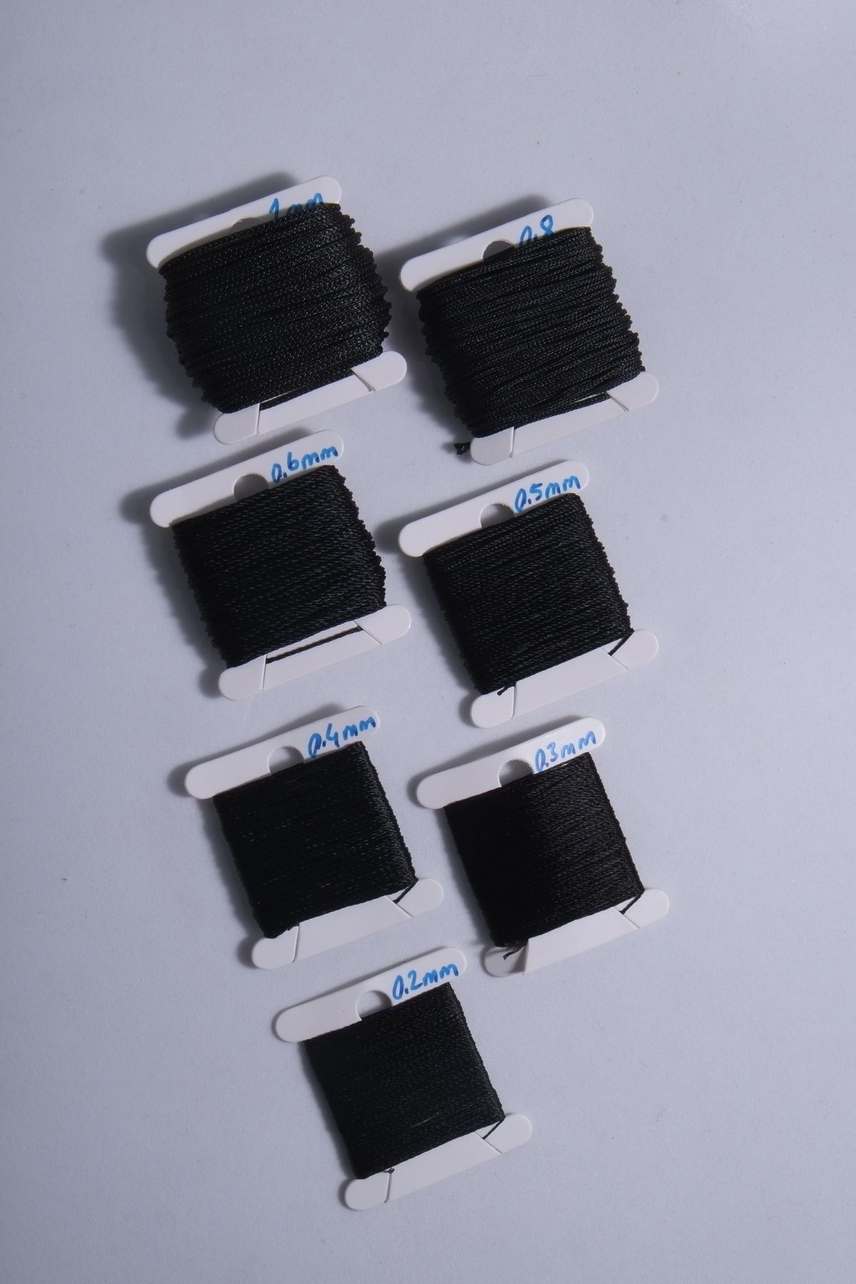 10 Metre 7 Ölçü Tesbih Ipi Seti 0.2 Mm 0.3 Mm 0.4 Mm 0.5 Mm 0.6 Mm 0.8 Mm 1 Mm Siyah Toplam 70 Metre