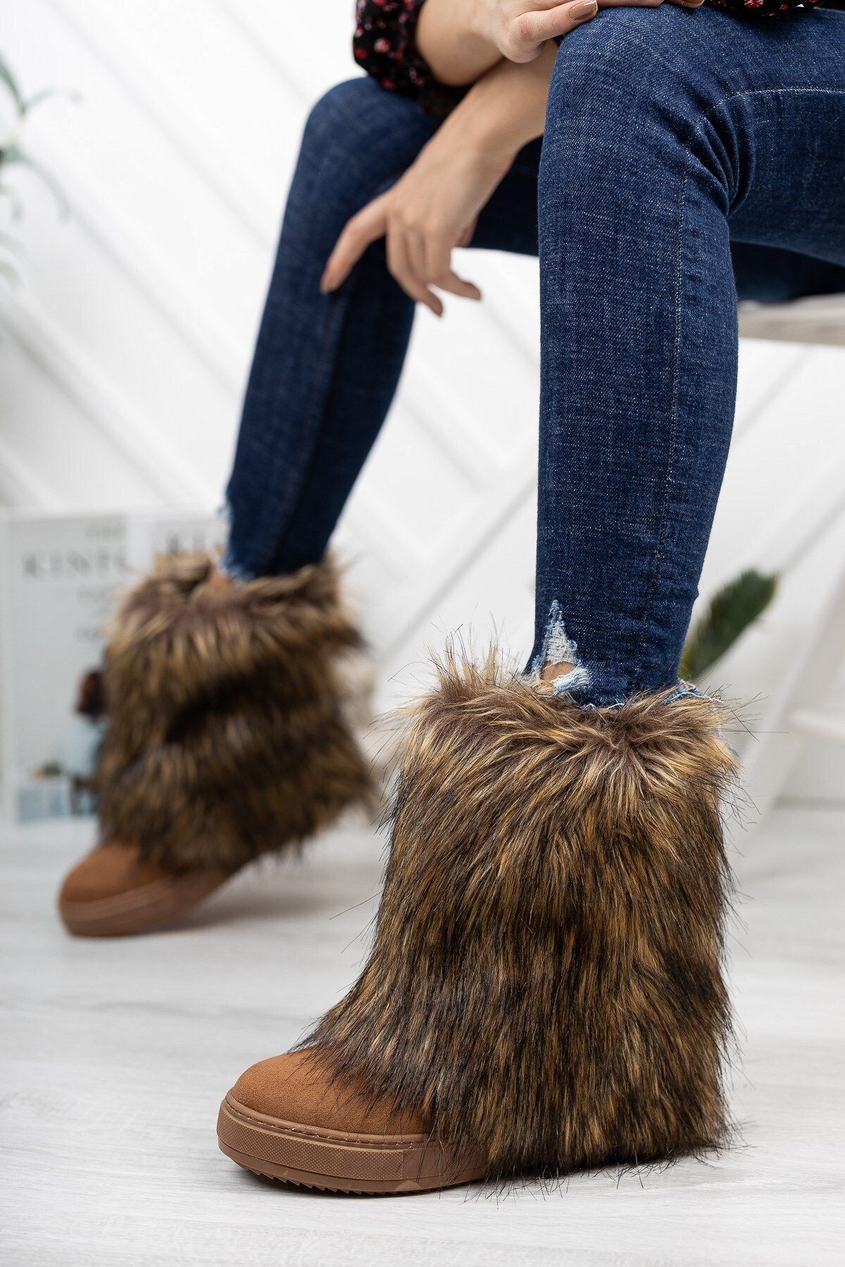 Tan fluffy best sale boots