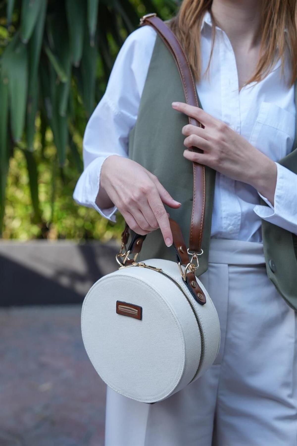 Round tan bag top