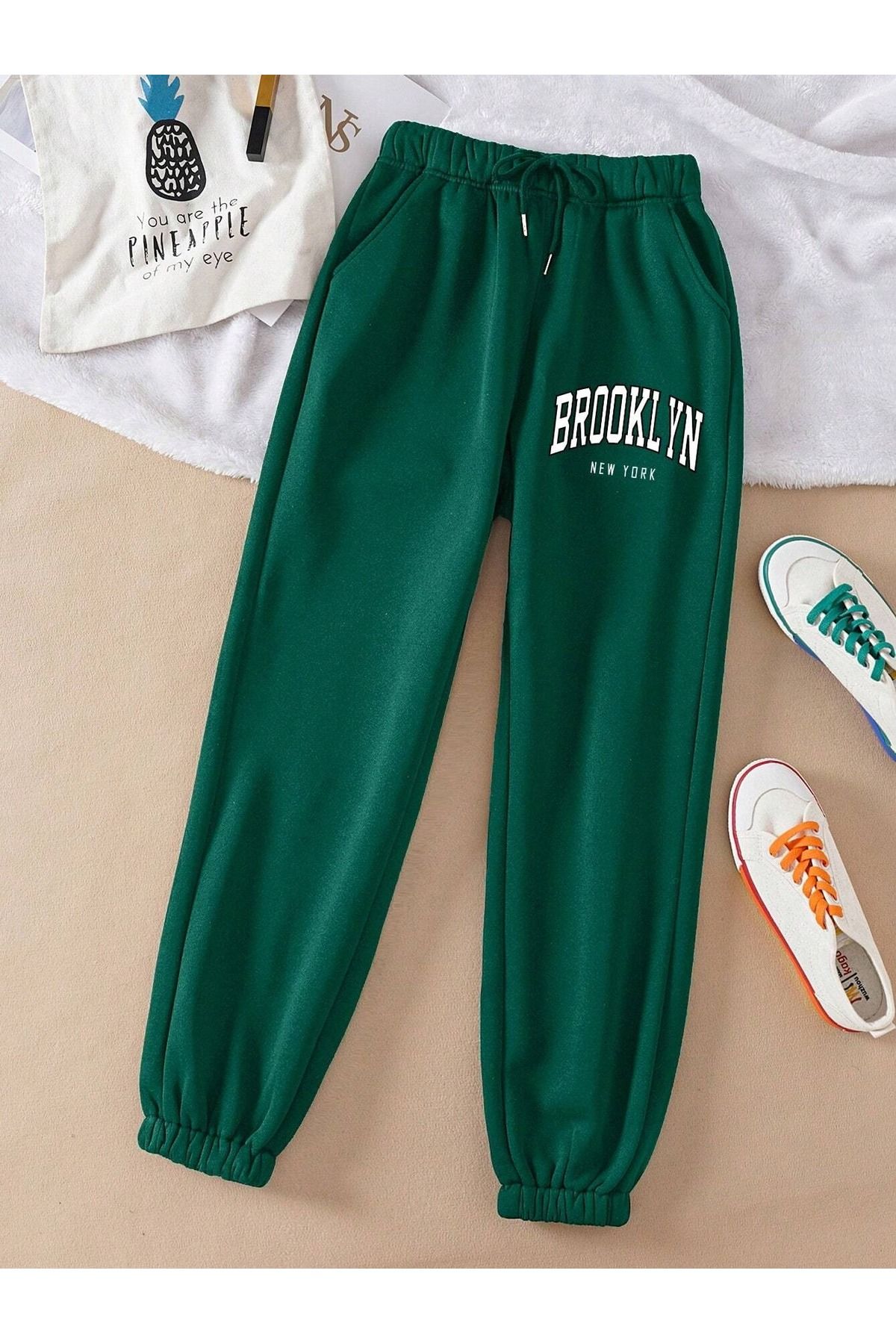 Green and red sweatpants sales
