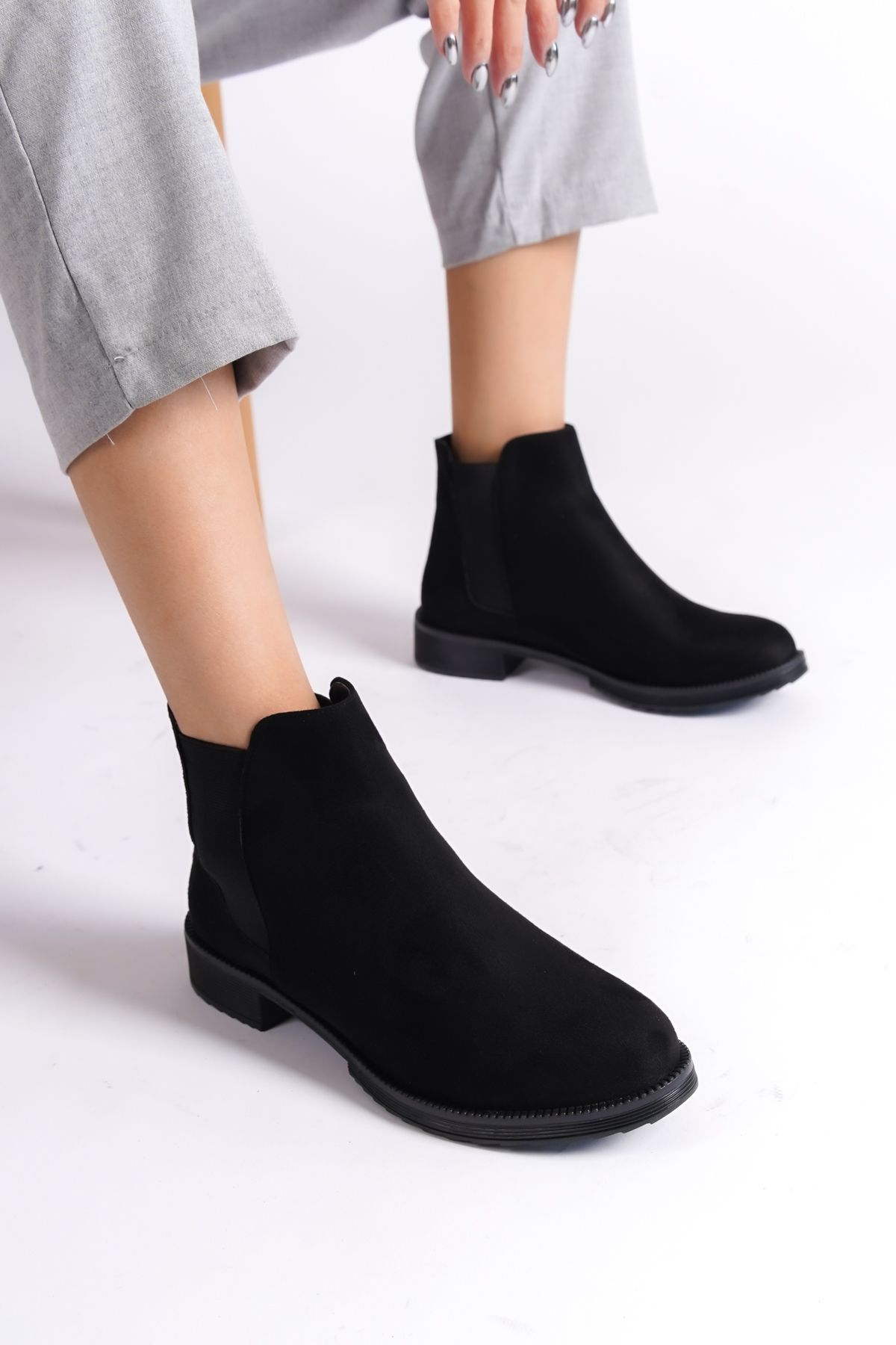 Ankle boots with elastic sale sides