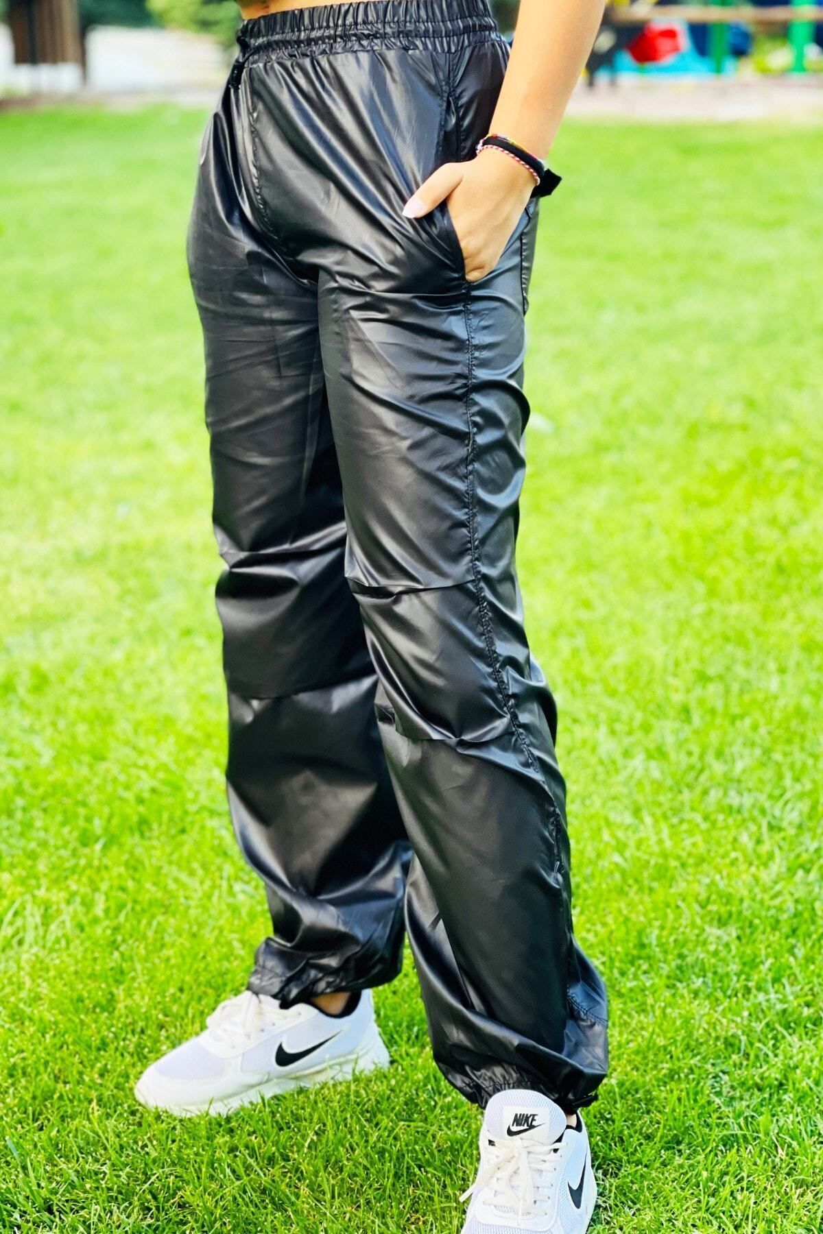 Shiny nylon sales track pants