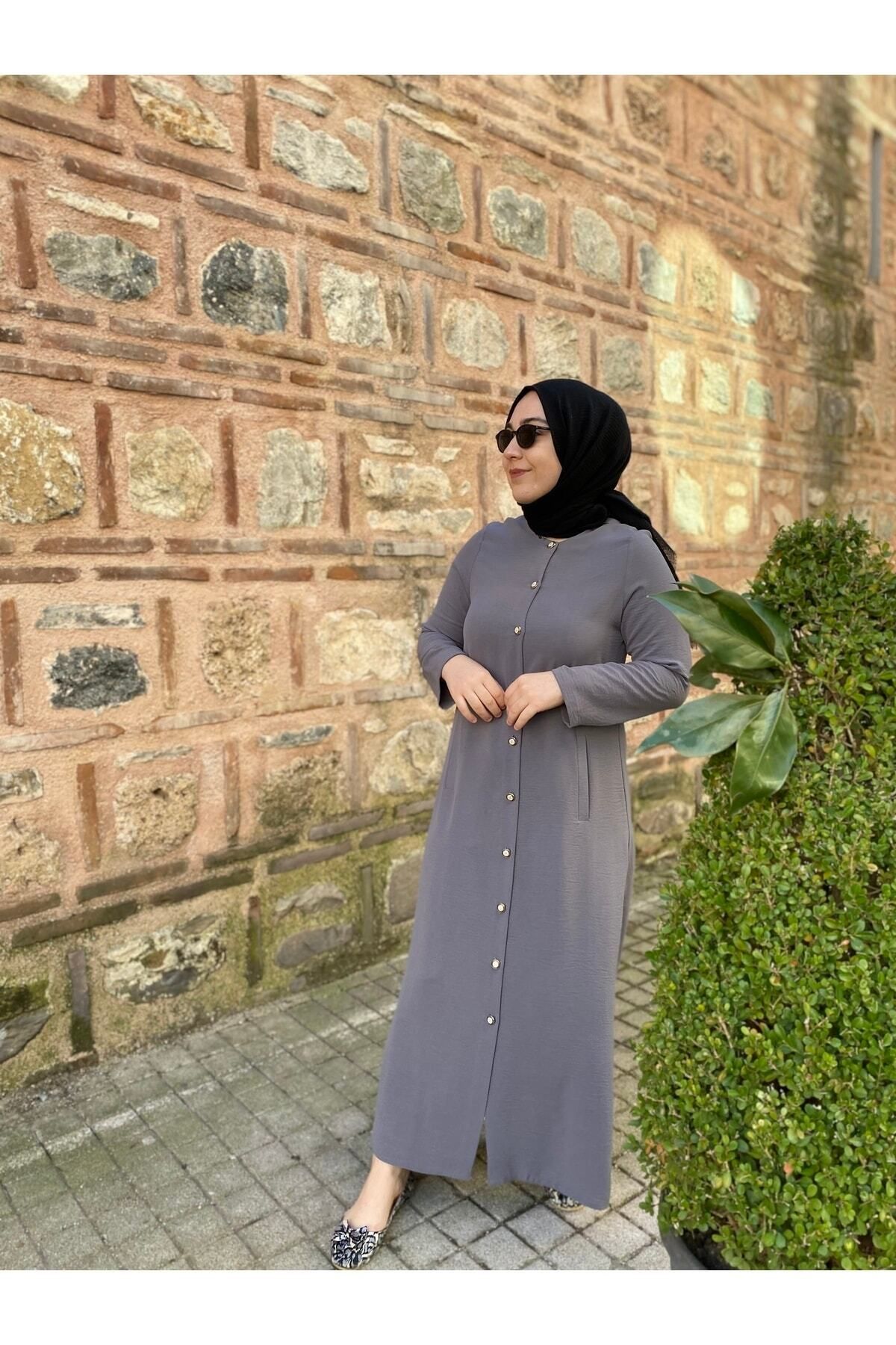 Buttoned abaya store