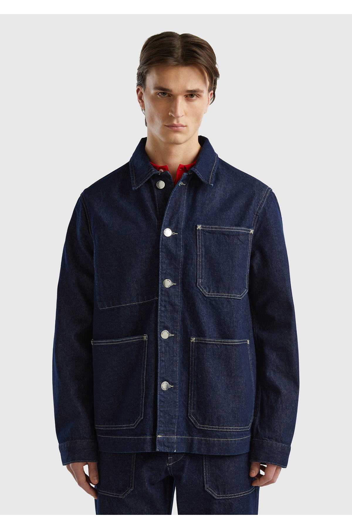 یونایتد کالرز آو بنتون کاپشن جین مردانه سرمه‌ای ۱۰۰٪ پنبه‌ای با جیب‌های جلو