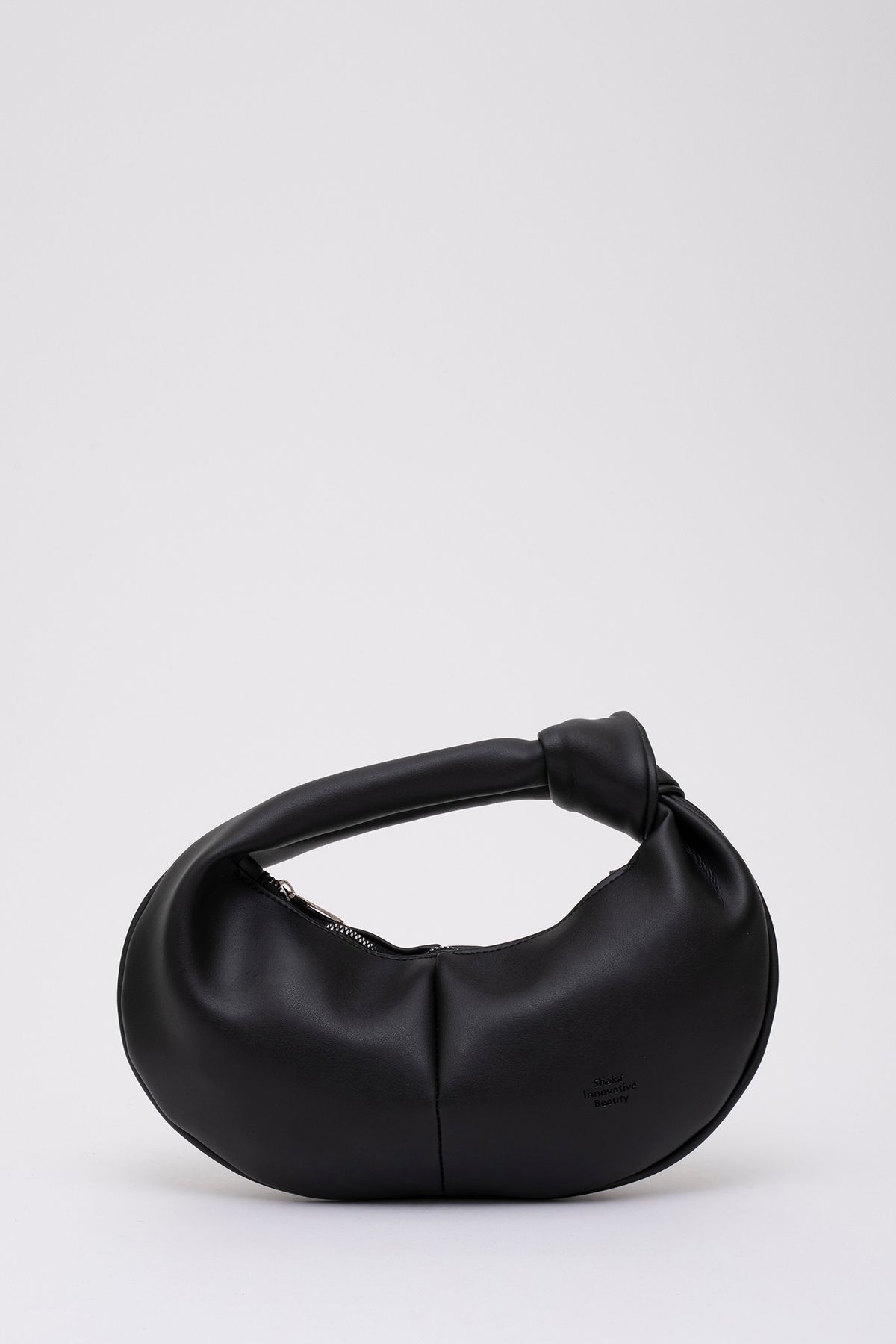 cest un sac en cuir en peau artificielle avec des nœuds détaillés de shk98