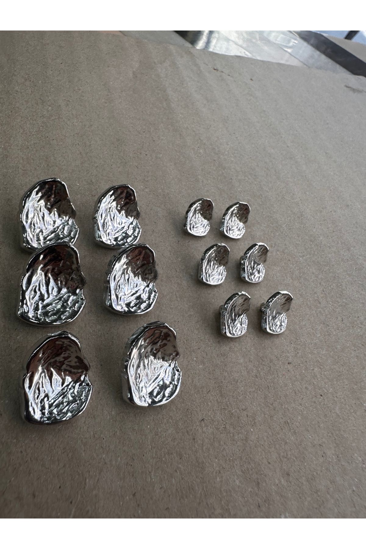 ODDA TASARIM ATÖLYESİ-Asymmetric cambered shell model silver button set 3