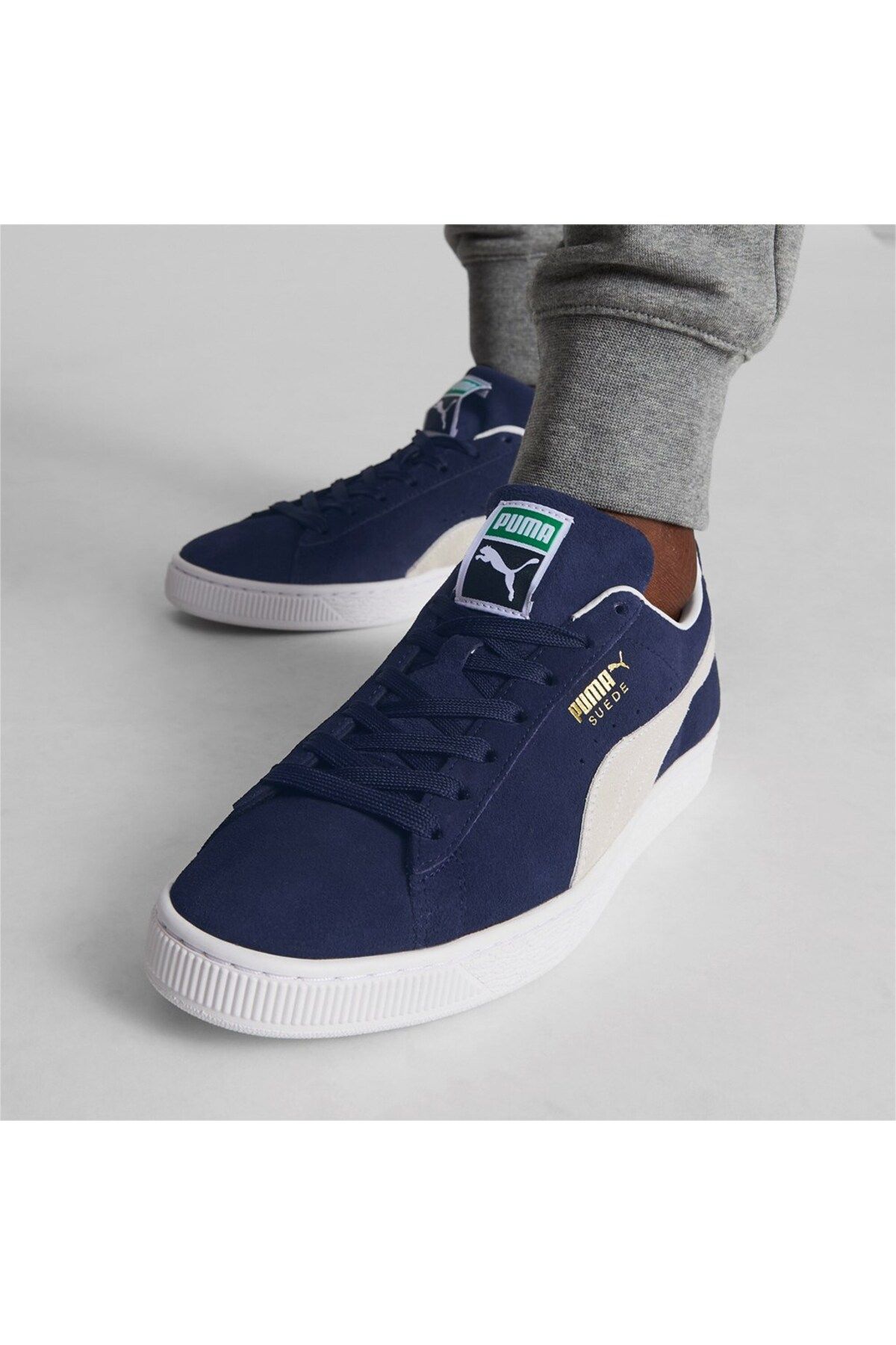 Grey and blue top puma suedes