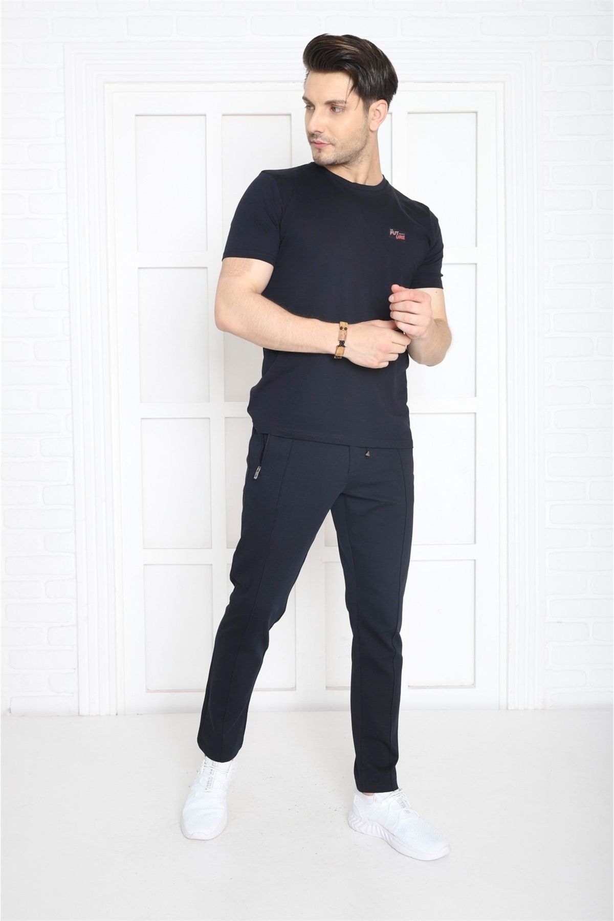 شلوار گرمکن ورزشی مردانه آبی دریایی که به دنبال 4 جیب با ZIPPER SLIMFIT TRATSSUIT SIX B1216 هستند Escetic