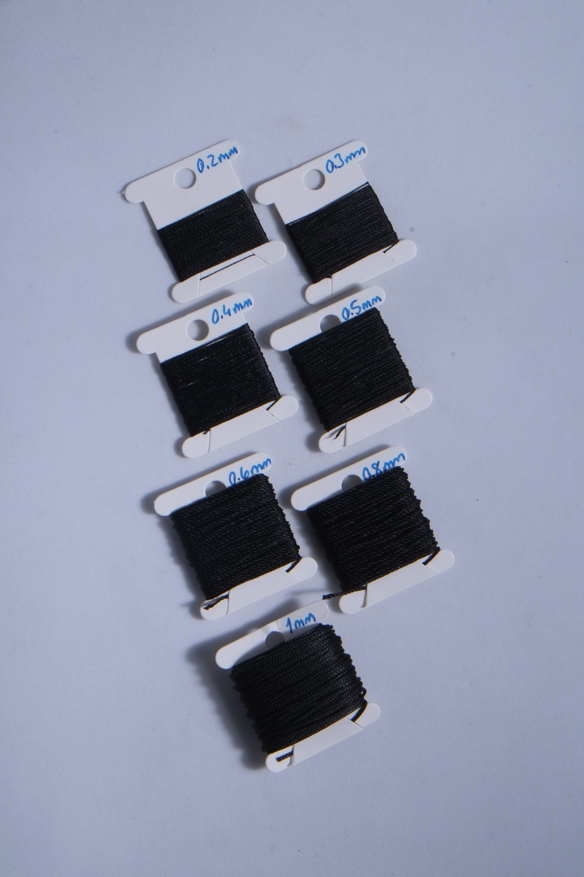 5 Metre 7 Ölçü Tesbih Ipi Seti 0.2 Mm 0.3 Mm 0.4 Mm 0.5 Mm 0.6 Mm 0.8 Mm 1 Mm Siyah Toplam 35 Metre