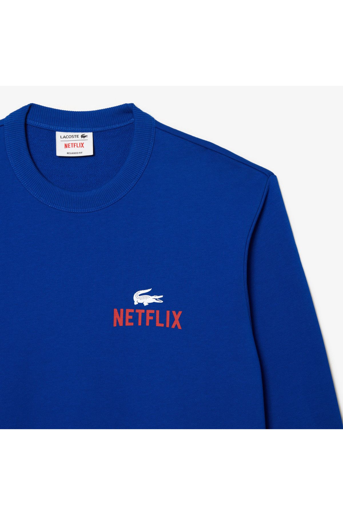Lacoste X Netflix Unisex به طور منظم یقه دوچرخه چاپی پیراهن آبی چاپ شده