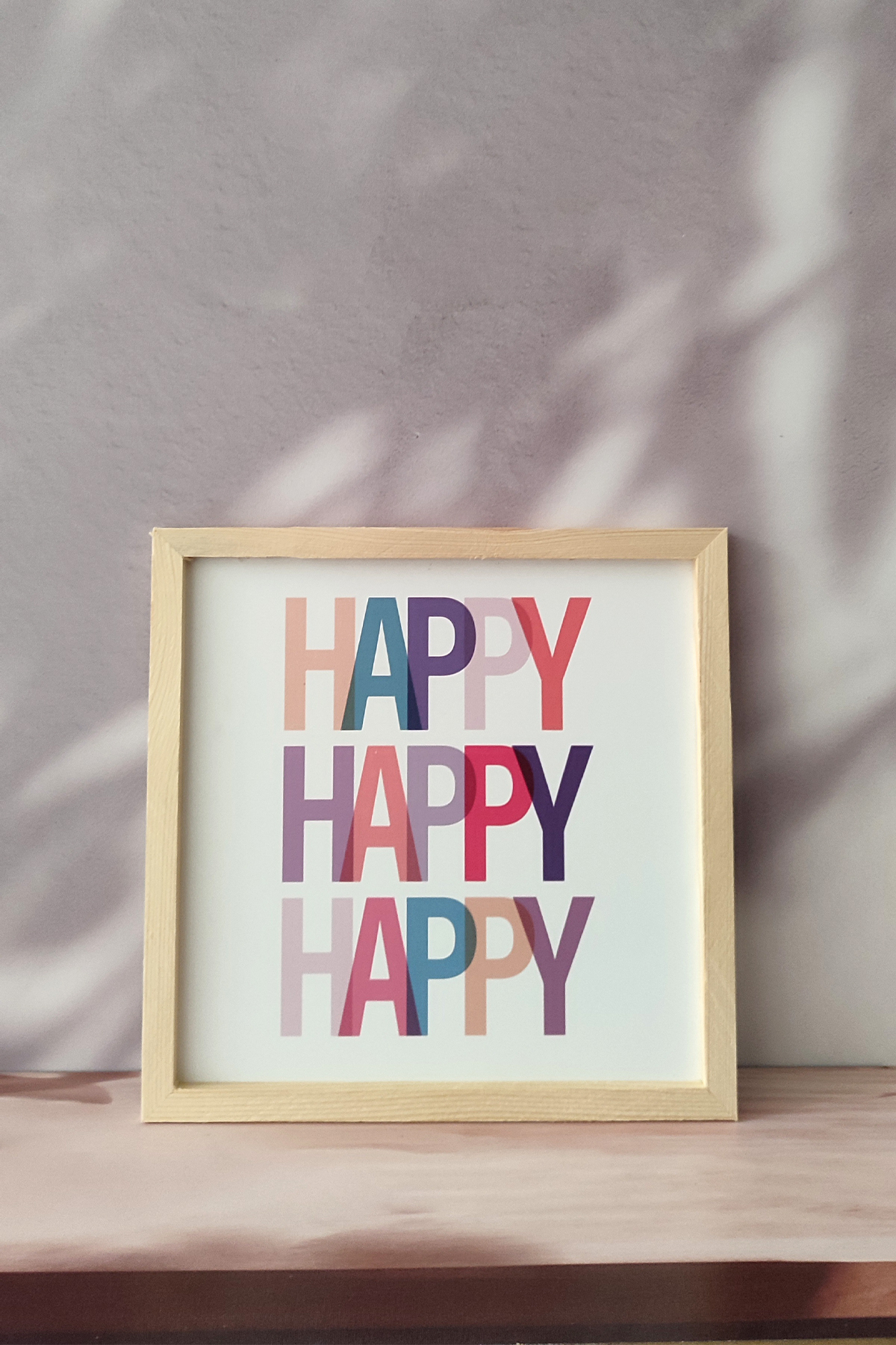 Painting with Wooden Frame with Colorful Happy Writing in Children's Room