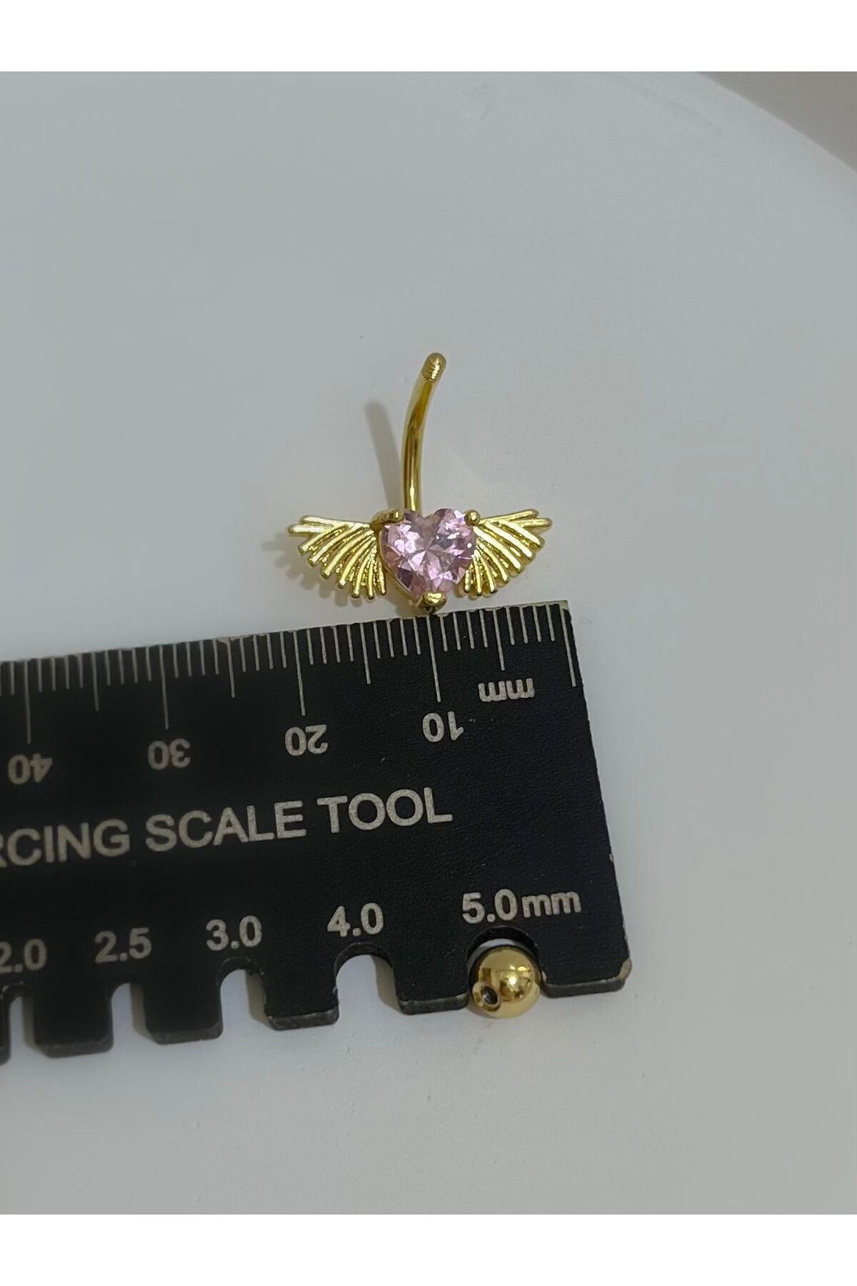 CERRAHİ ÇELİK PEMBE TAŞLI KALPLİ KANATLI GOLD RENK GÖBEK PİERCİNGİ