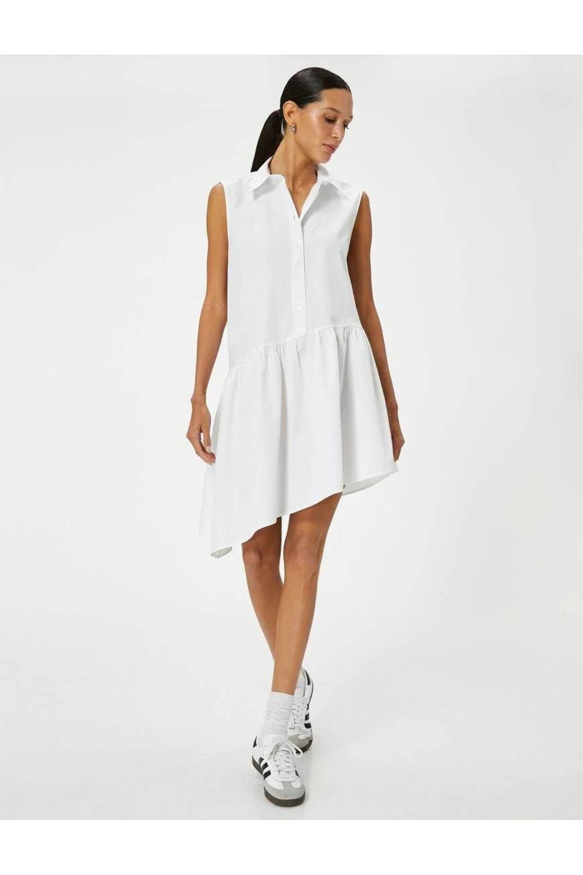 پیراهن برش نامتقارن آستین دکمه دار برش پنبه ای راحت