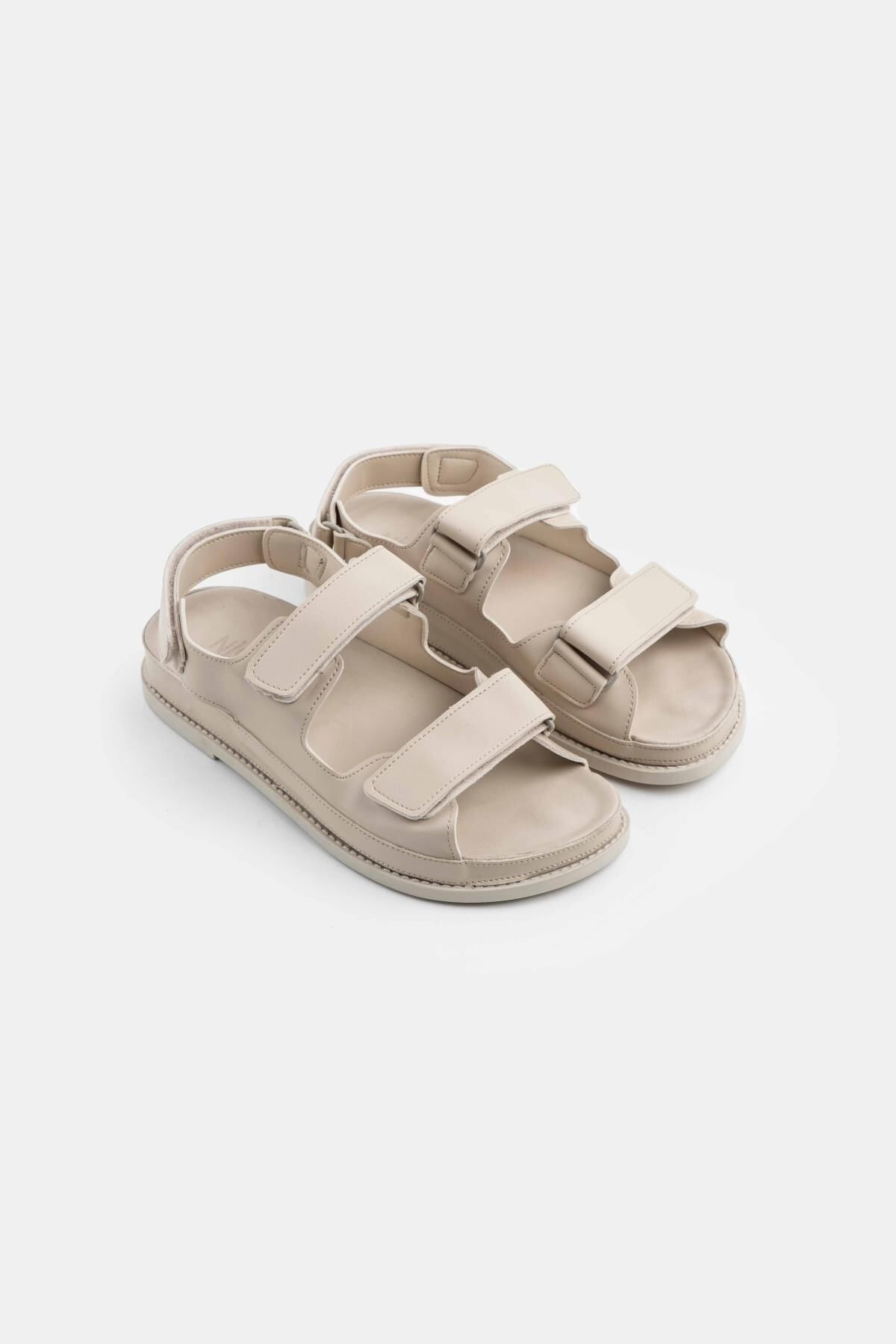 NİŞANTAŞI SHOES-Sandały damskie Julia w beżowym matowym kolorze na rzep z płaską podeszwą 8