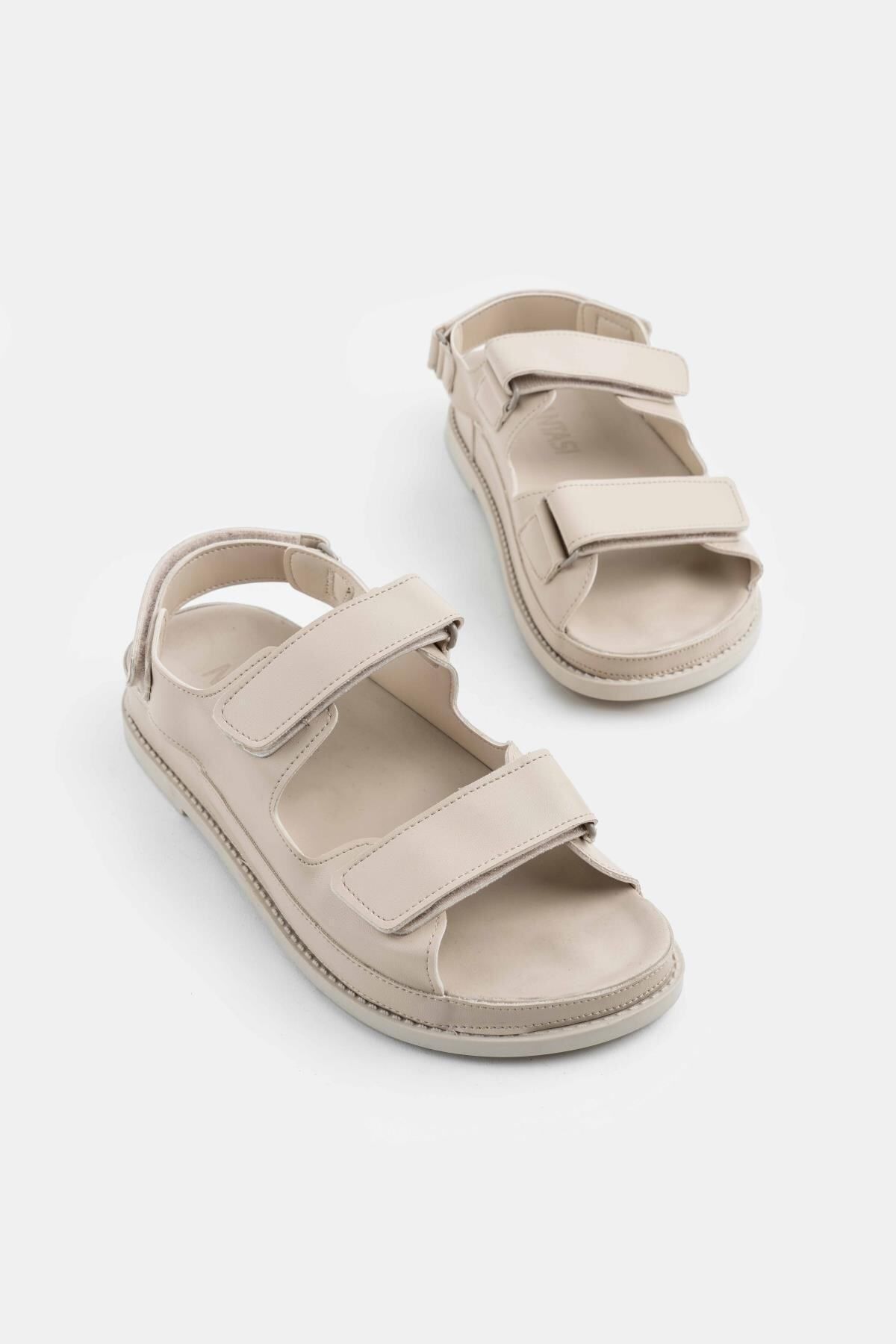 NİŞANTAŞI SHOES-Sandały damskie Julia w beżowym matowym kolorze na rzep z płaską podeszwą 7