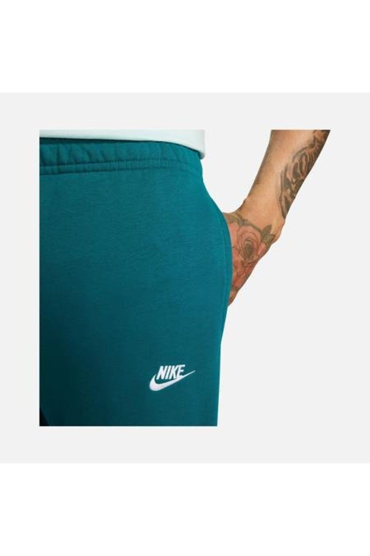 Nike club joggers ash green deals