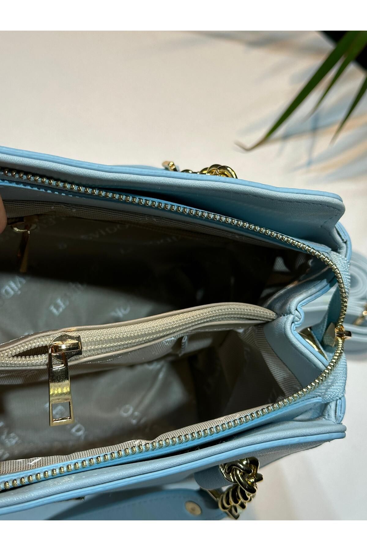 کیف شانه ای آبی زنانه levdr.930133.mav دستی خاص و بازو که به عنوان چرمی مصنوعی طراحی شده است Levidor