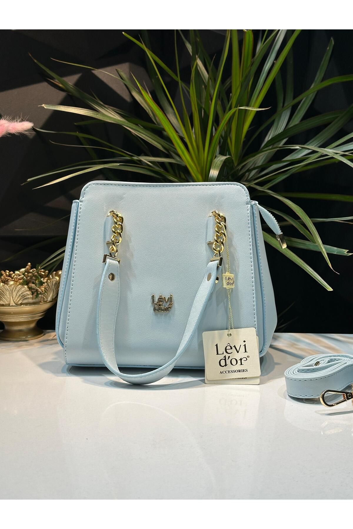 کیف شانه ای آبی زنانه levdr.930133.mav دستی خاص و بازو که به عنوان چرمی مصنوعی طراحی شده است Levidor