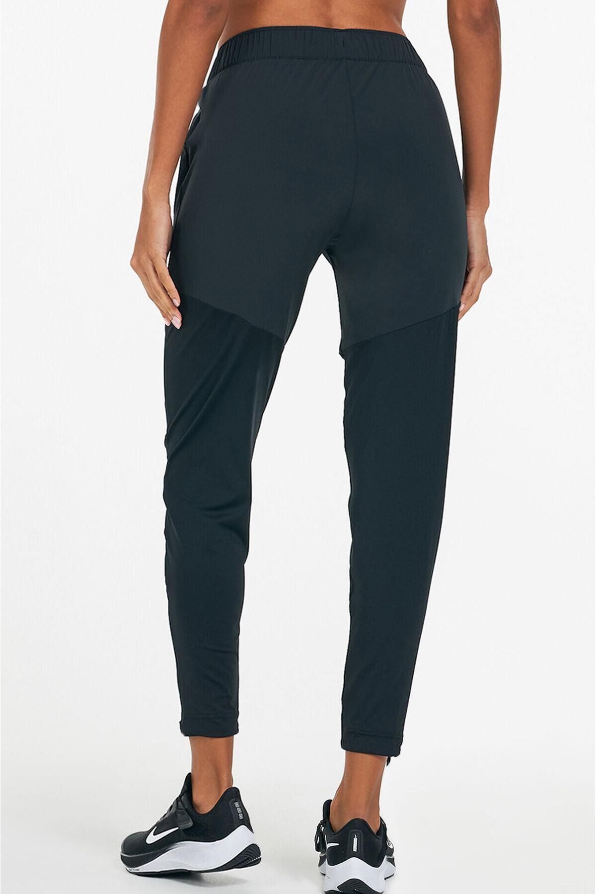 Nike Black Dri Fit Essential Women s Sweatpants Running Ankle Top Trendyol
