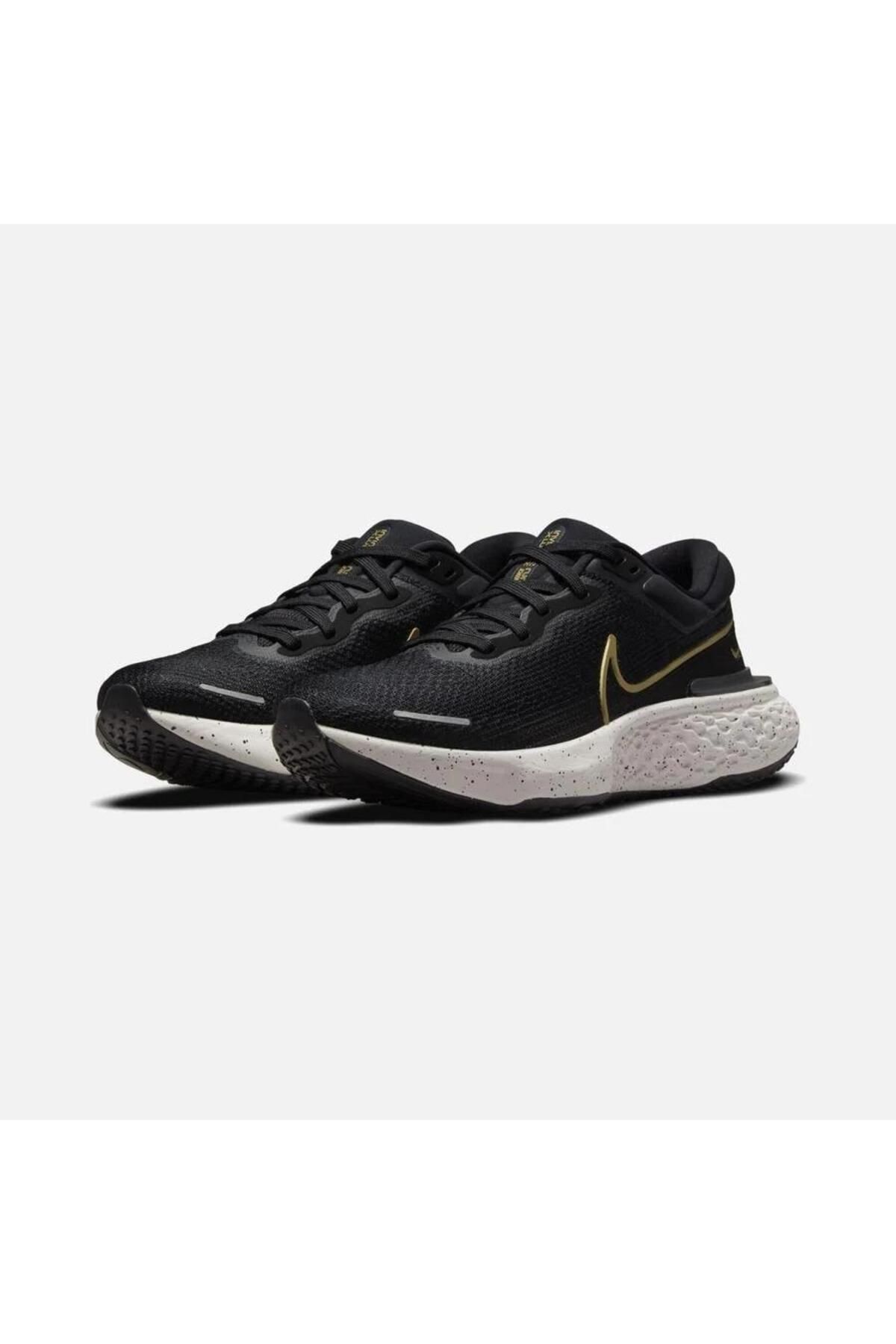 Nike epic react flyknit black gold on sale