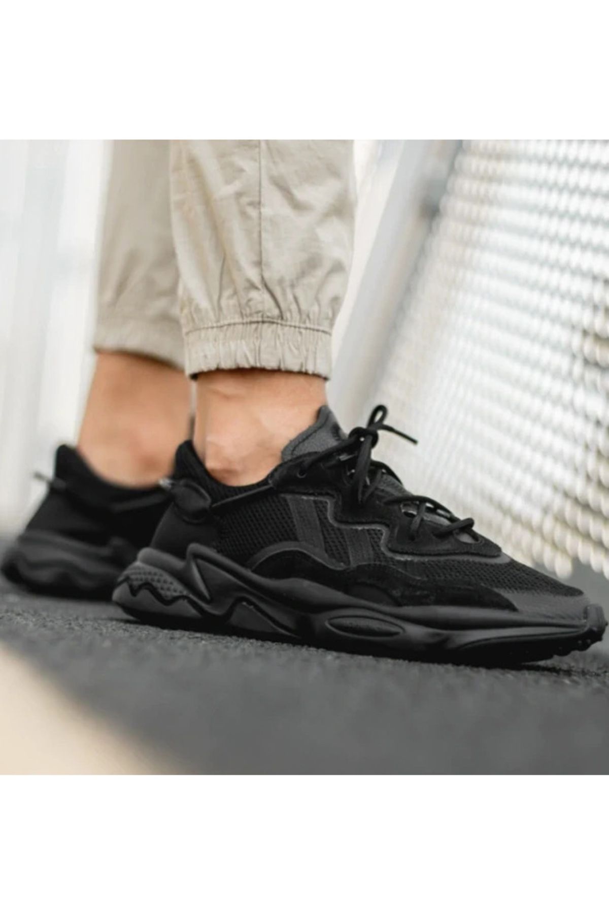 کفش ورزشی گاه به گاه Ozweego کفش کتانی مشکی adidas