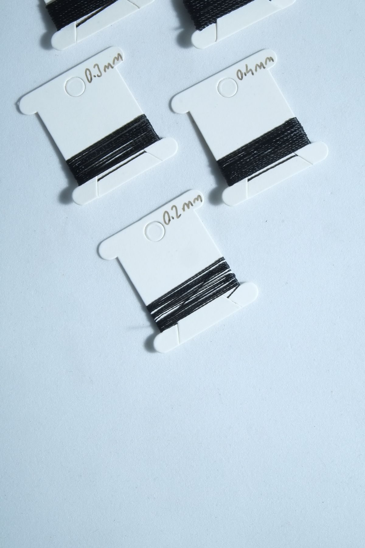 1 Metre 7 Ölçü Tesbih Ipi Seti 0.2 Mm 0.3 Mm 0.4 Mm 0.5 Mm 0.6 Mm 0.8 Mm 1 Mm Siyah Renk