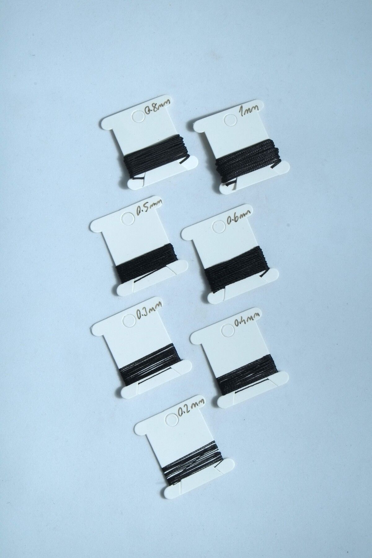1 Metre 7 Ölçü Tesbih Ipi Seti 0.2 Mm 0.3 Mm 0.4 Mm 0.5 Mm 0.6 Mm 0.8 Mm 1 Mm Siyah Renk