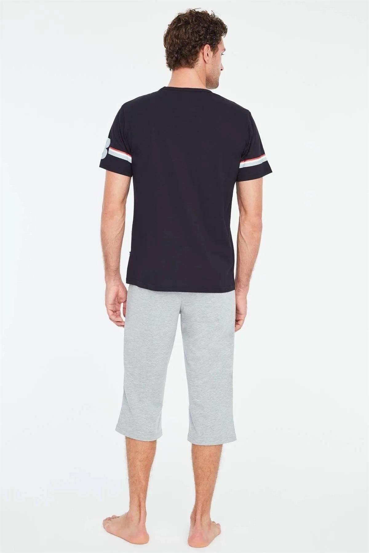ست پیژامه آبی مردانه تی شرت آستین کوتاه یقه گرد و کاپری جیبی U.S. Polo Assn.