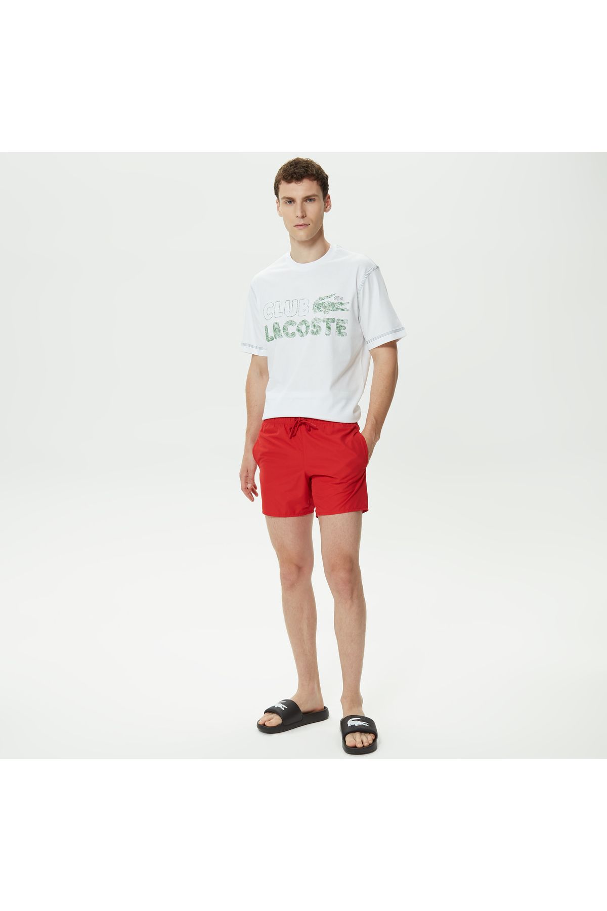 Красные мужские шорты для купальника Lacoste TYC00838229042