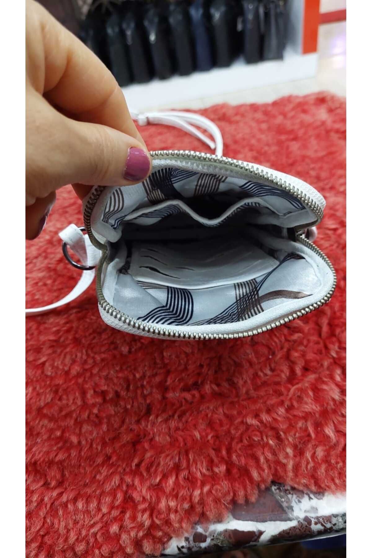 HAKİKİ DERİ TELEFON ÇANTASI