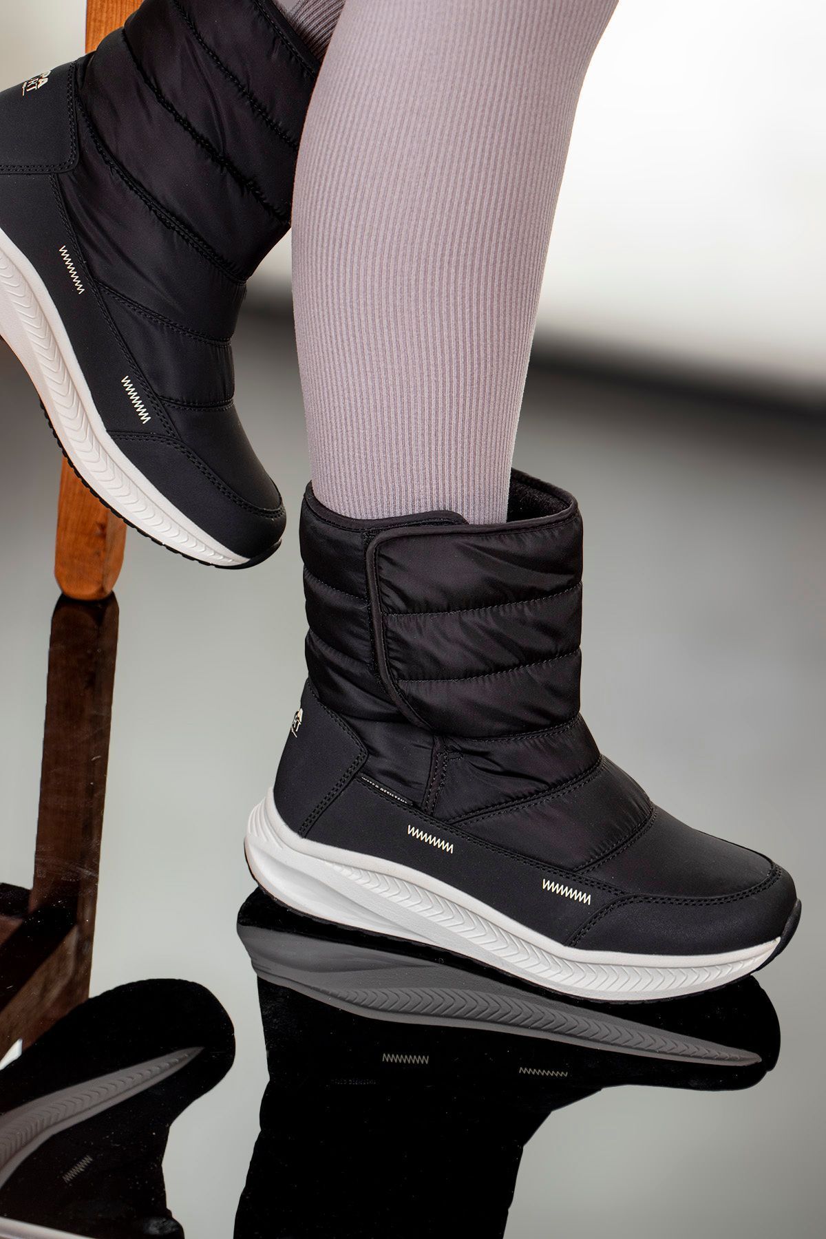 چکمه‌های برفی یونیسکس با خط گرم Clark Vocal Velcro 867800000502 U.S. Polo Assn.