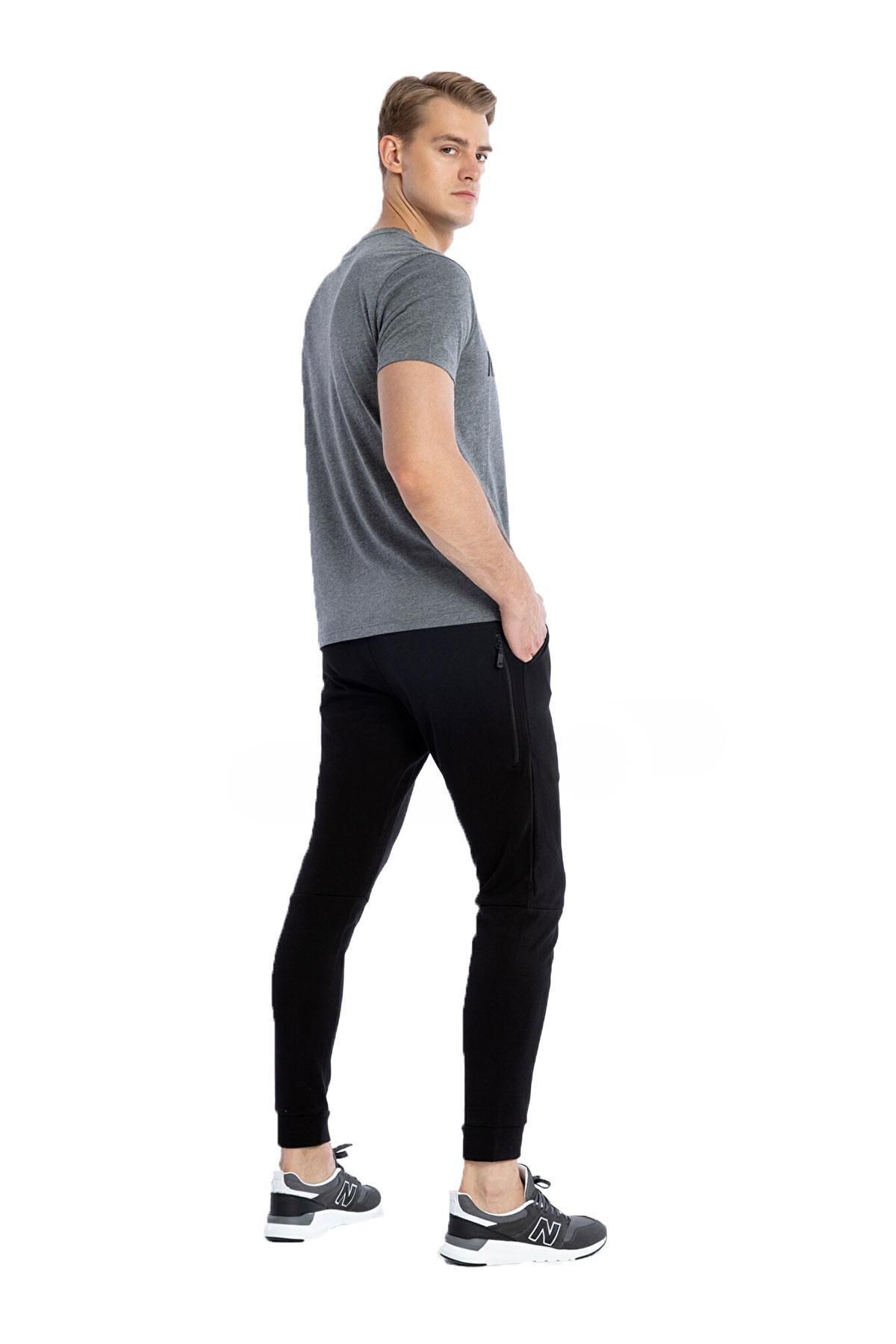 شلوار ورزشی نیو بالانس مردانه  مشکی اسپرت راسته Regular/رگولار فاق نرمال   جاگر اسپرت | New Balance TYC25BEBBC9F33BC10 TR - تصویر 3