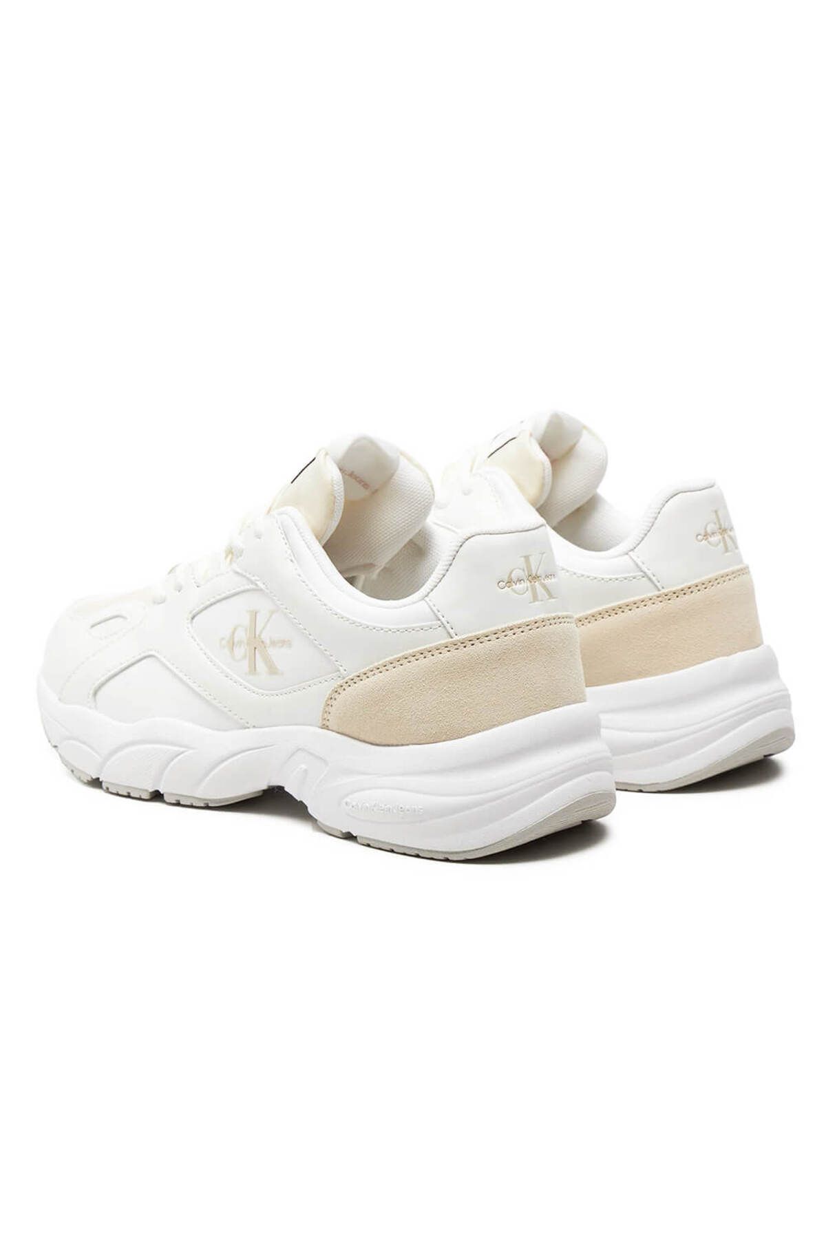 Chanel cc logo triple white sneaker hot sale