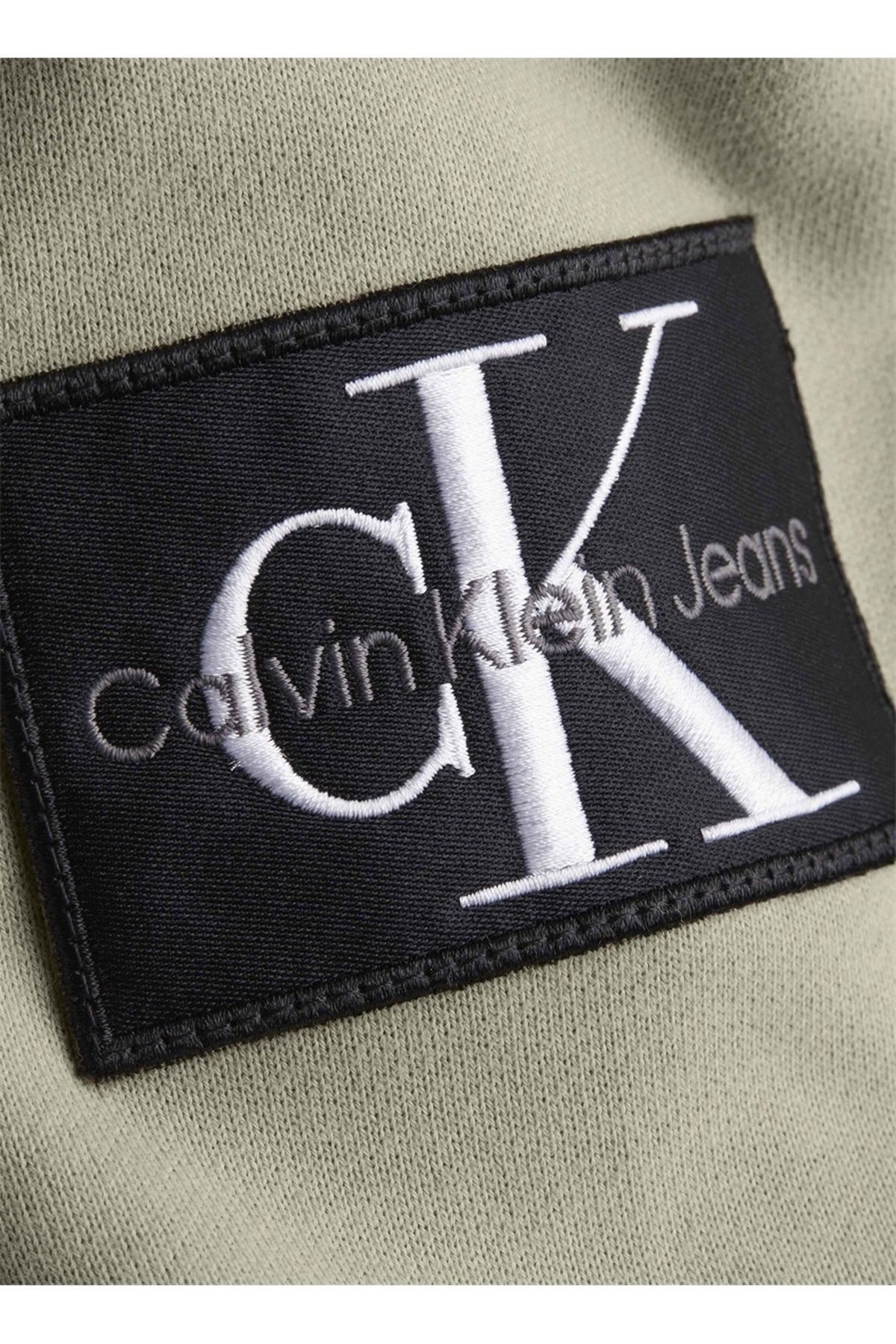 سویشرت نود مردانه آستین بلند با یقه گرد سیاهههای و پیراهن بژ J30J323426 PED Calvin Klein