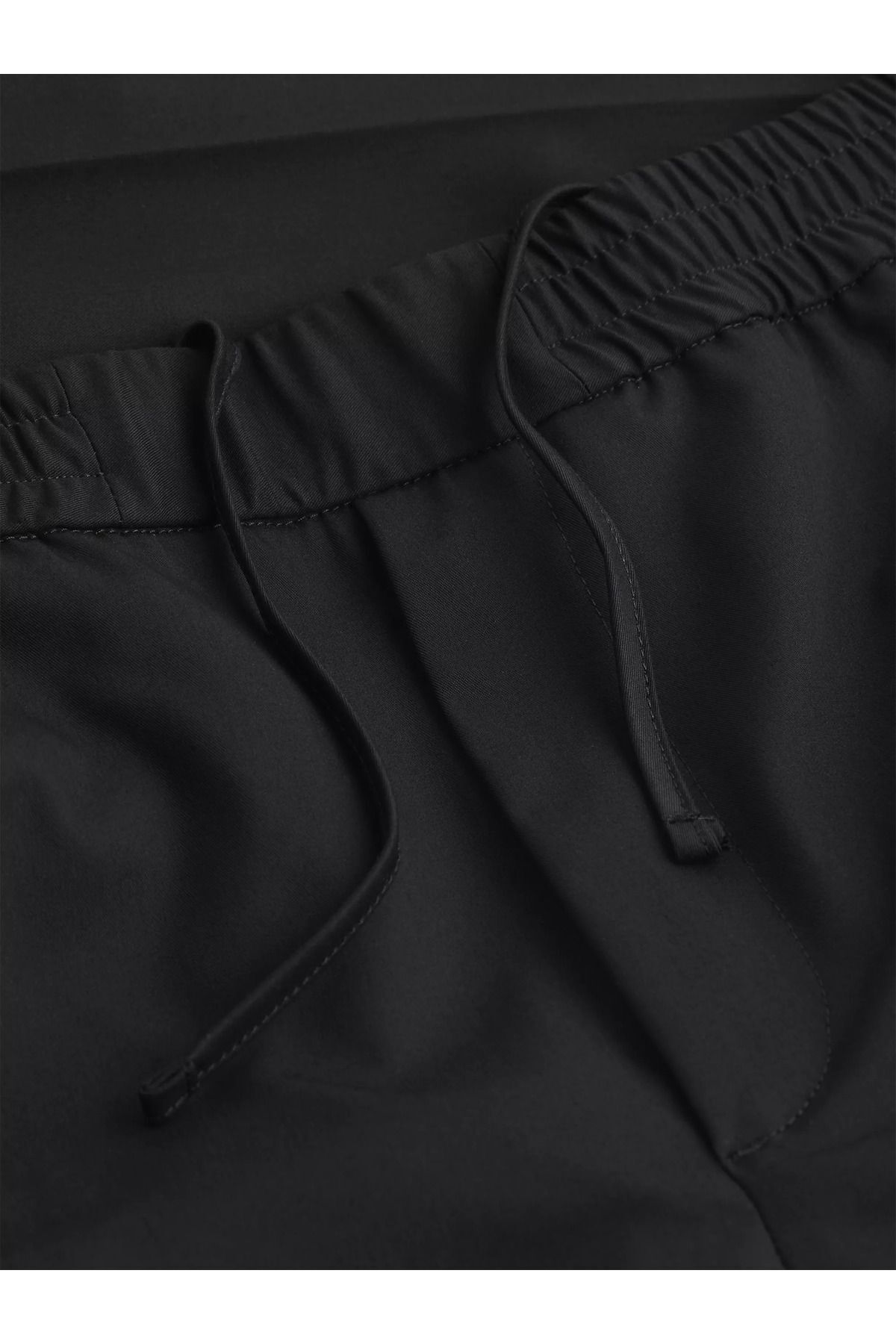 شلوار مشکی مردانه راحت سیاه و سفید شیک روزانه k10k11716 beh Calvin Klein