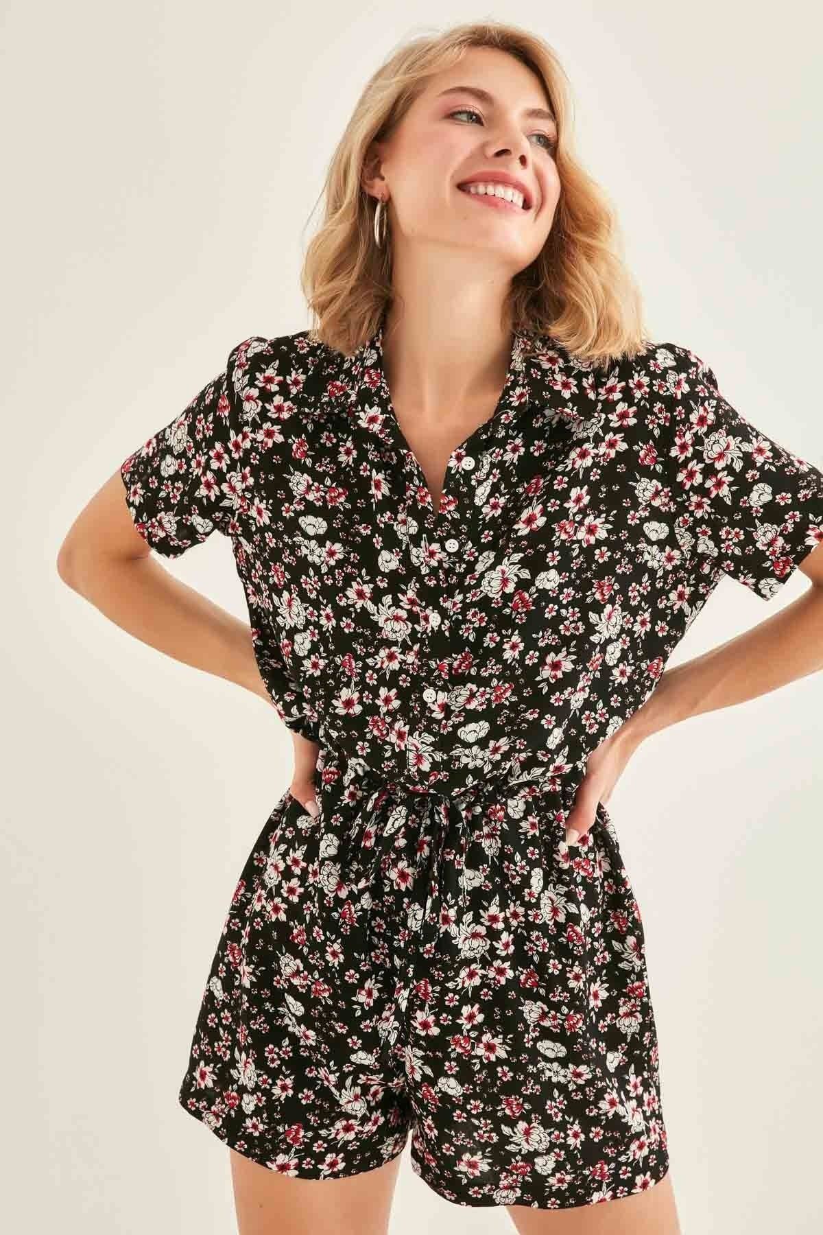 Black floral playsuit sales