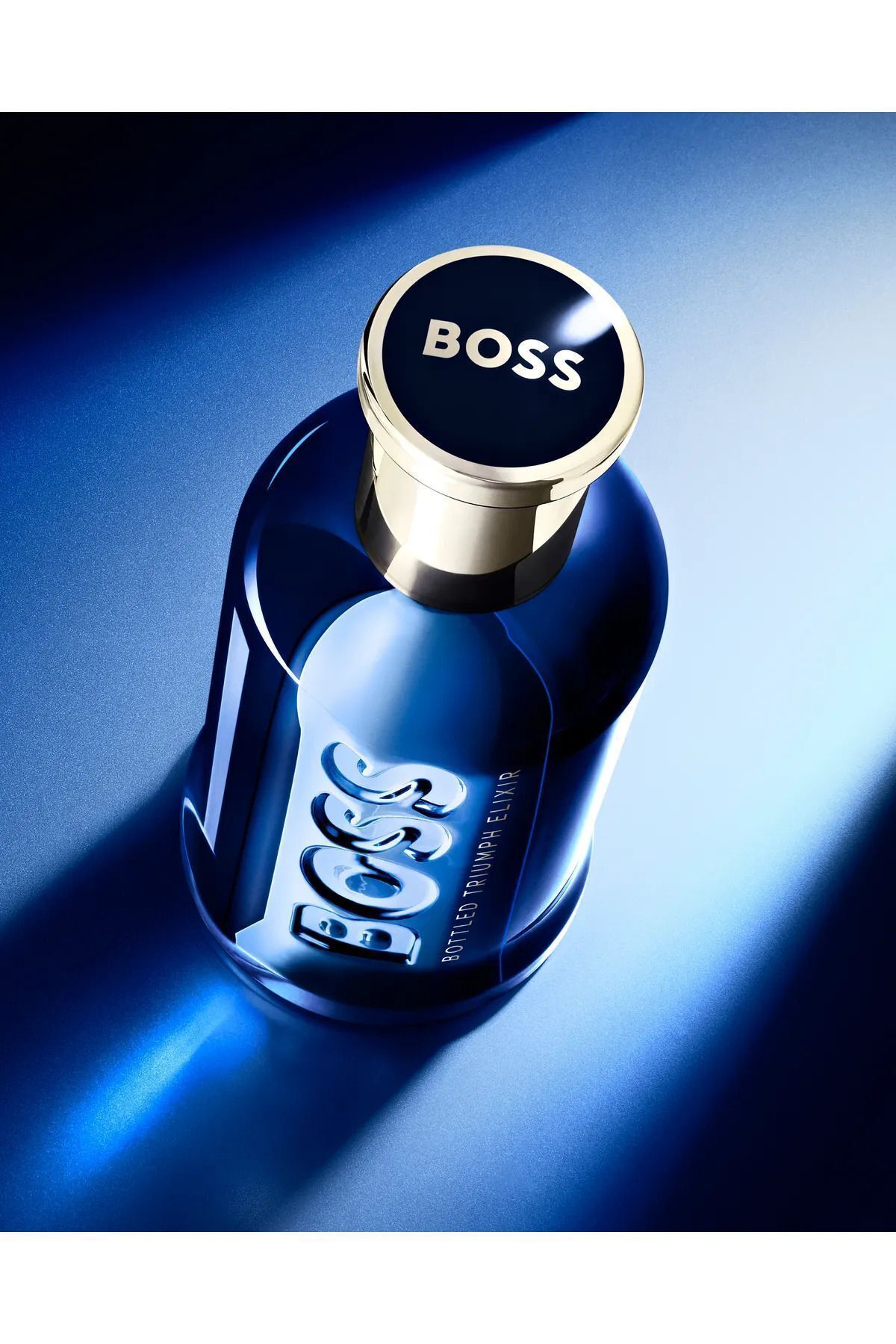عطر مردانه بطری TRIUMPH ELIXIR ادوپرفیوم 50 میل Hugo Boss