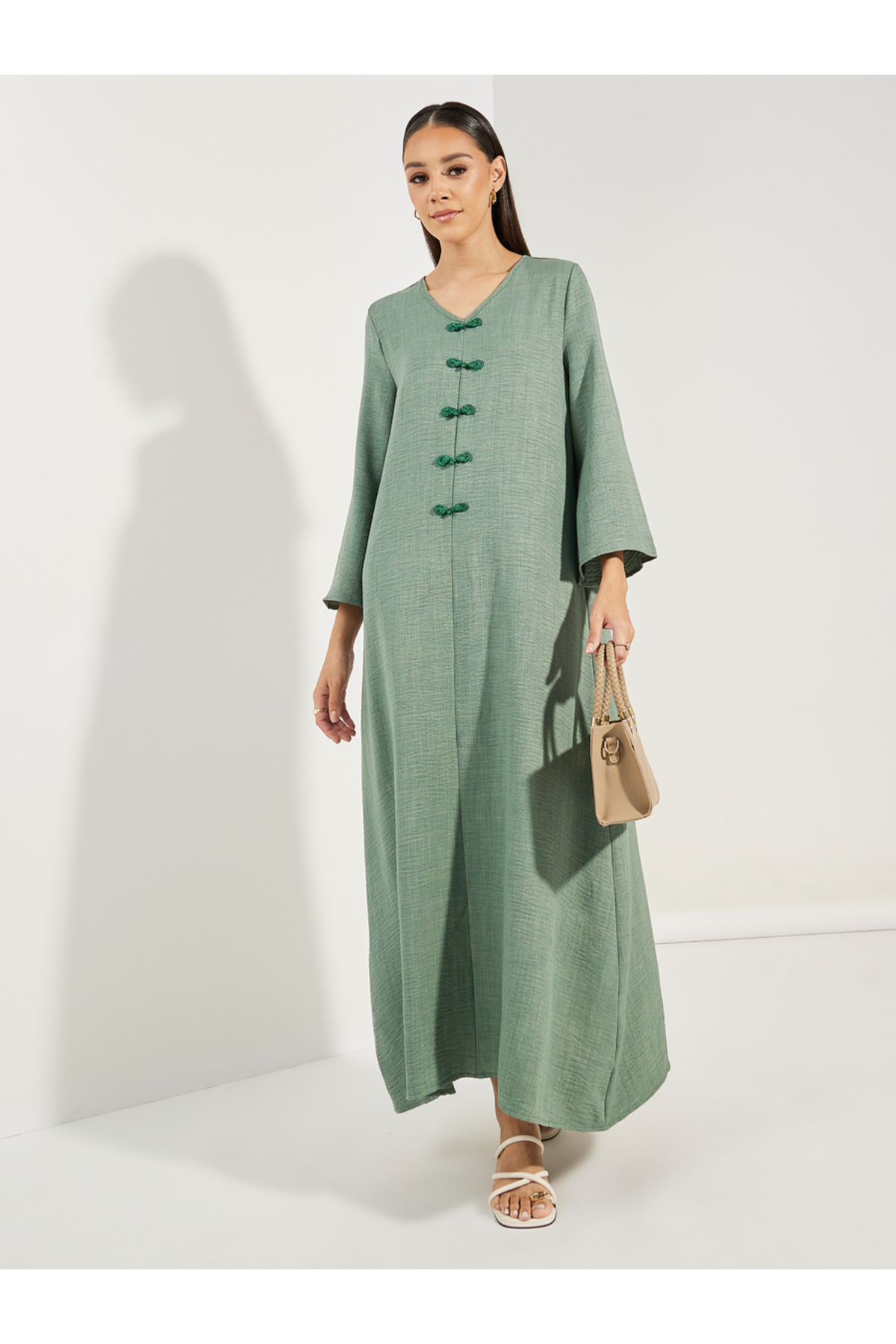 Styli Decorative Button Detail V Neck Jalabiya