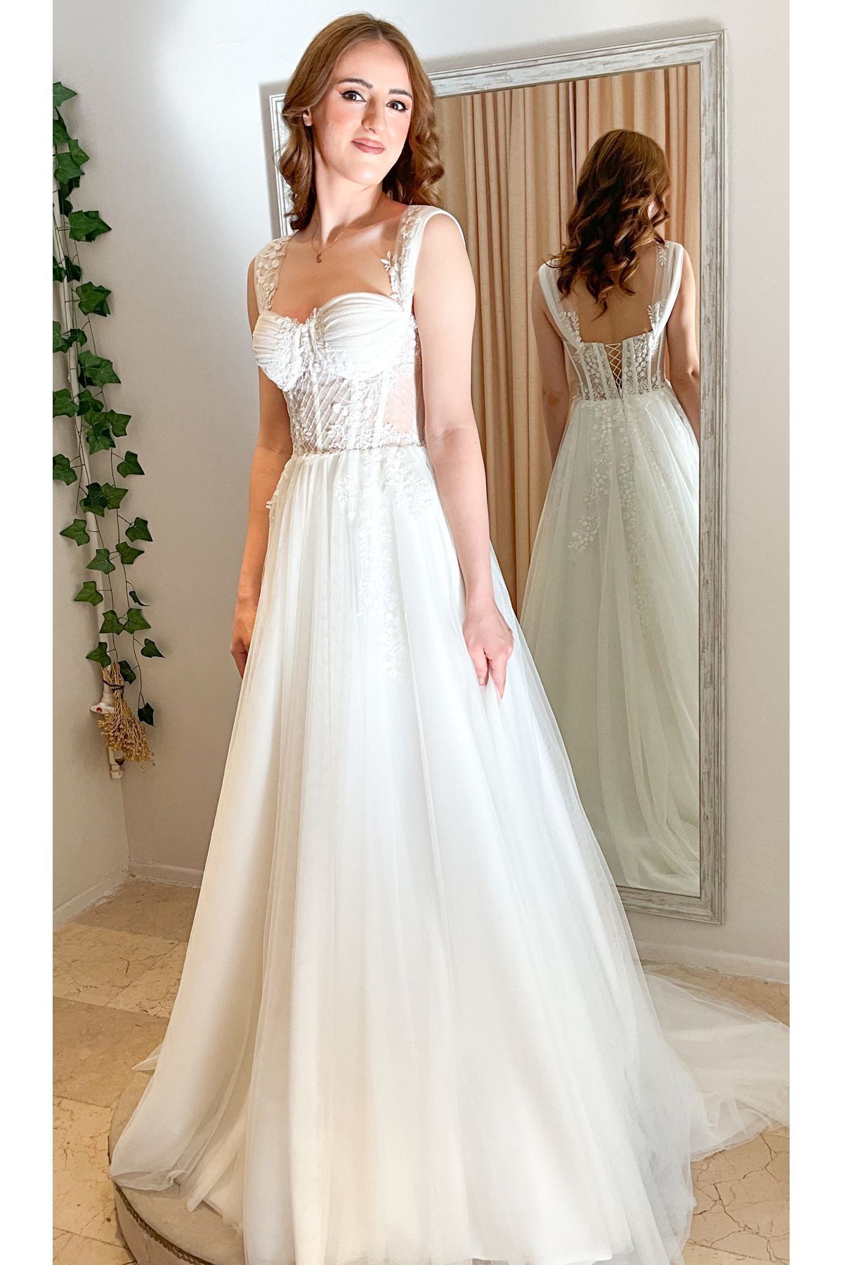 robe de mariée drapée en dentelle