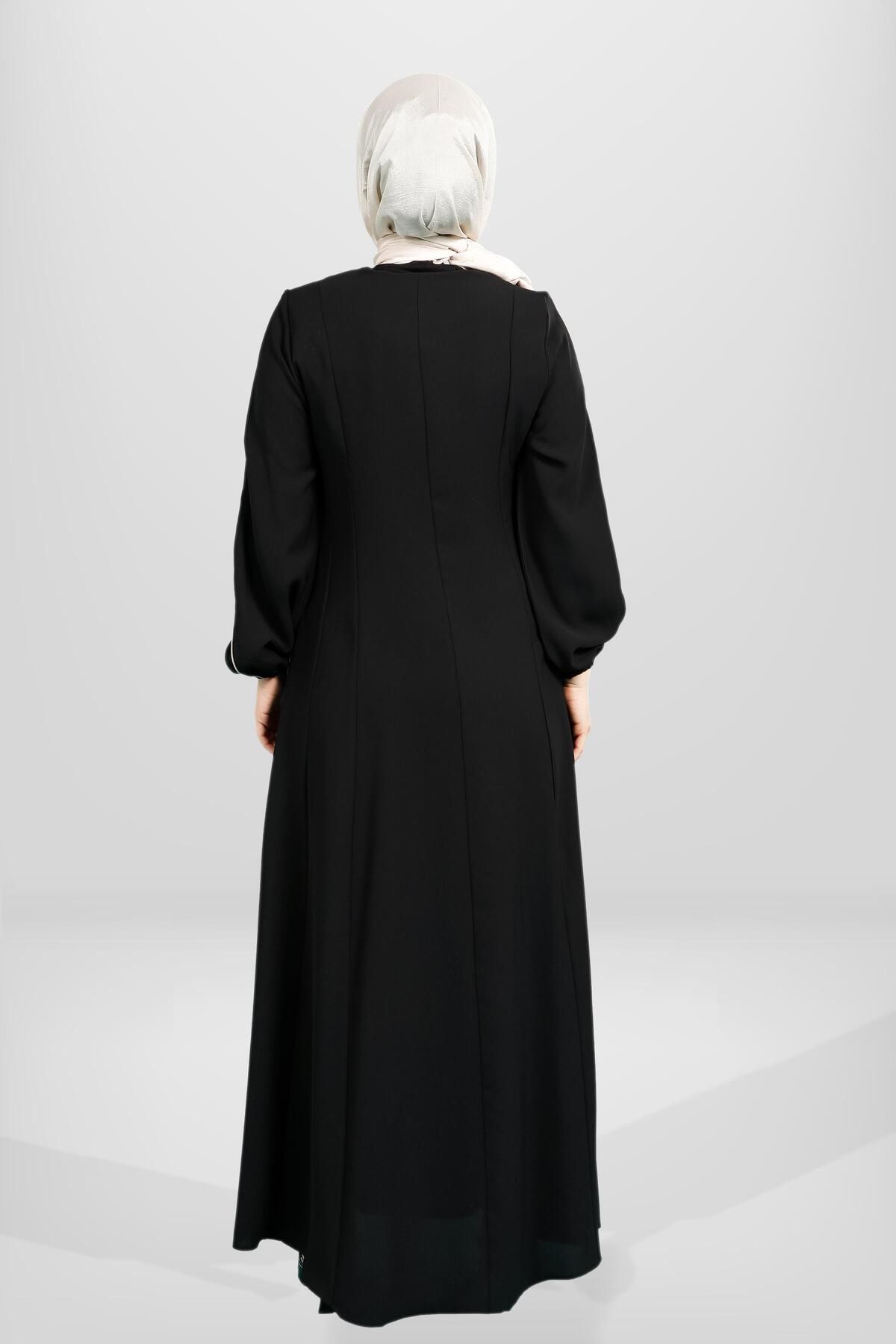 مانتو و عبای پوشیده زنانه پایه زیپ دار جیب جزئیات جانبی برش رنگ سیاه FERACE 3902 Beyza