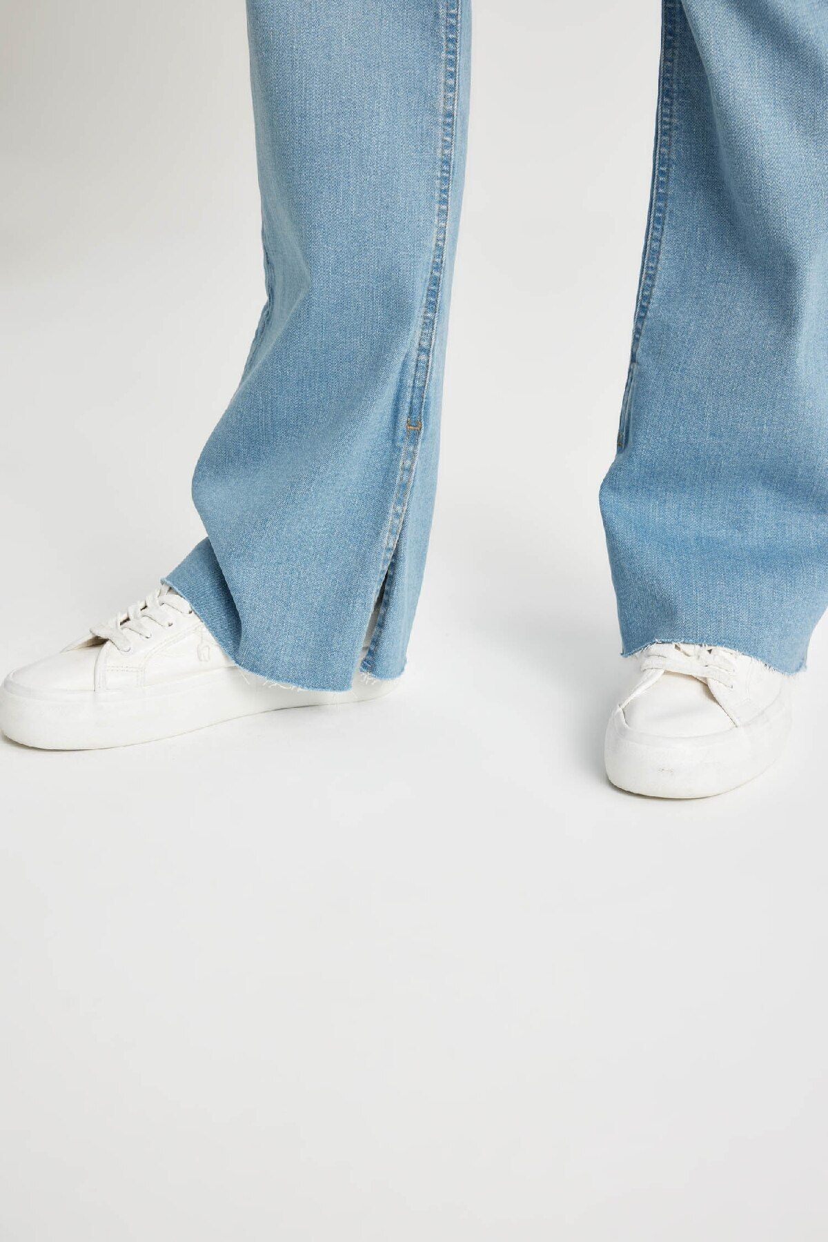 Slim Flare Yüksek Bel Paça Ucu Kesik Uzun Jean Pantolon C7619AX24AU