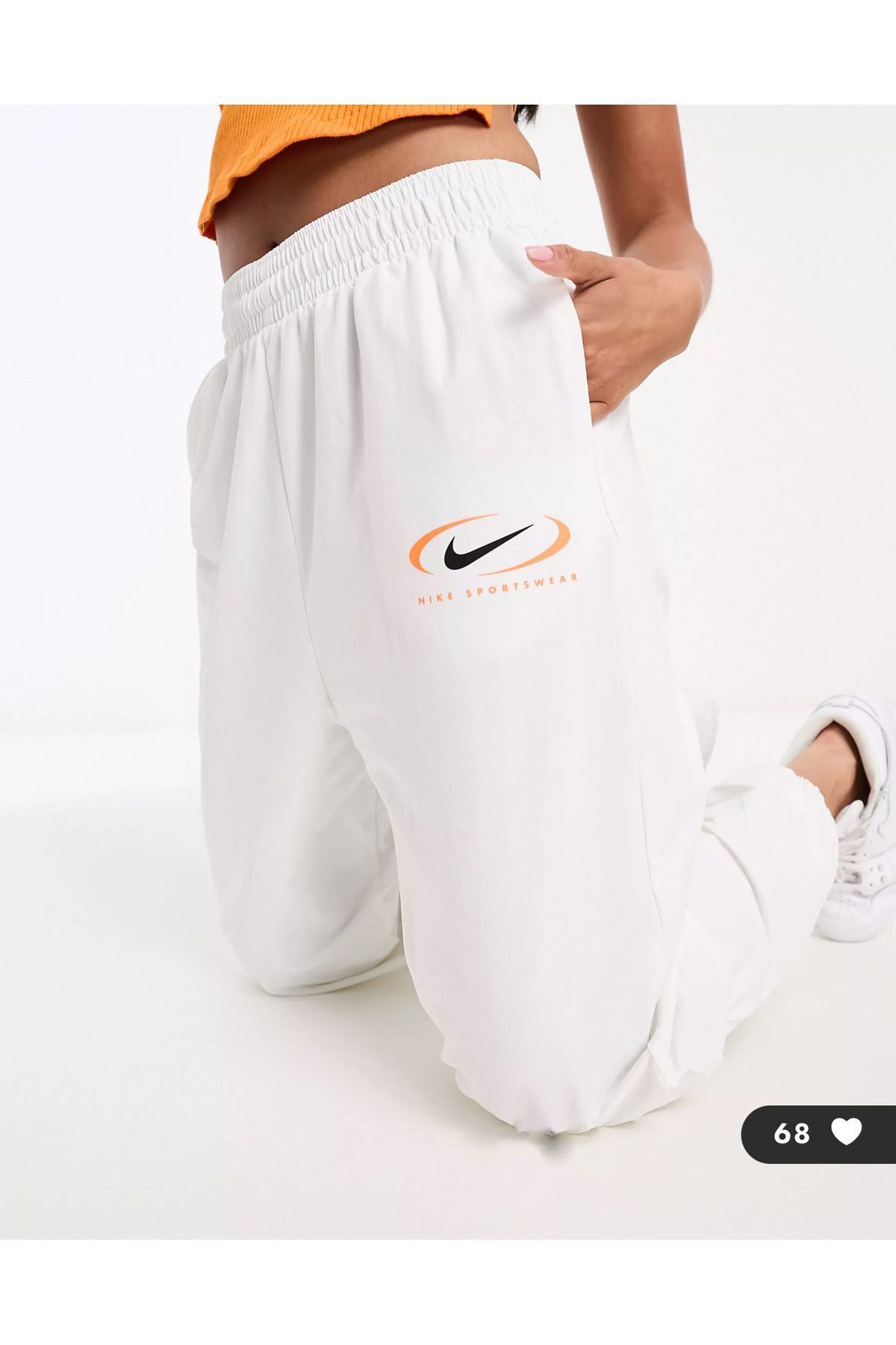 Nike swoosh track pants womens on sale