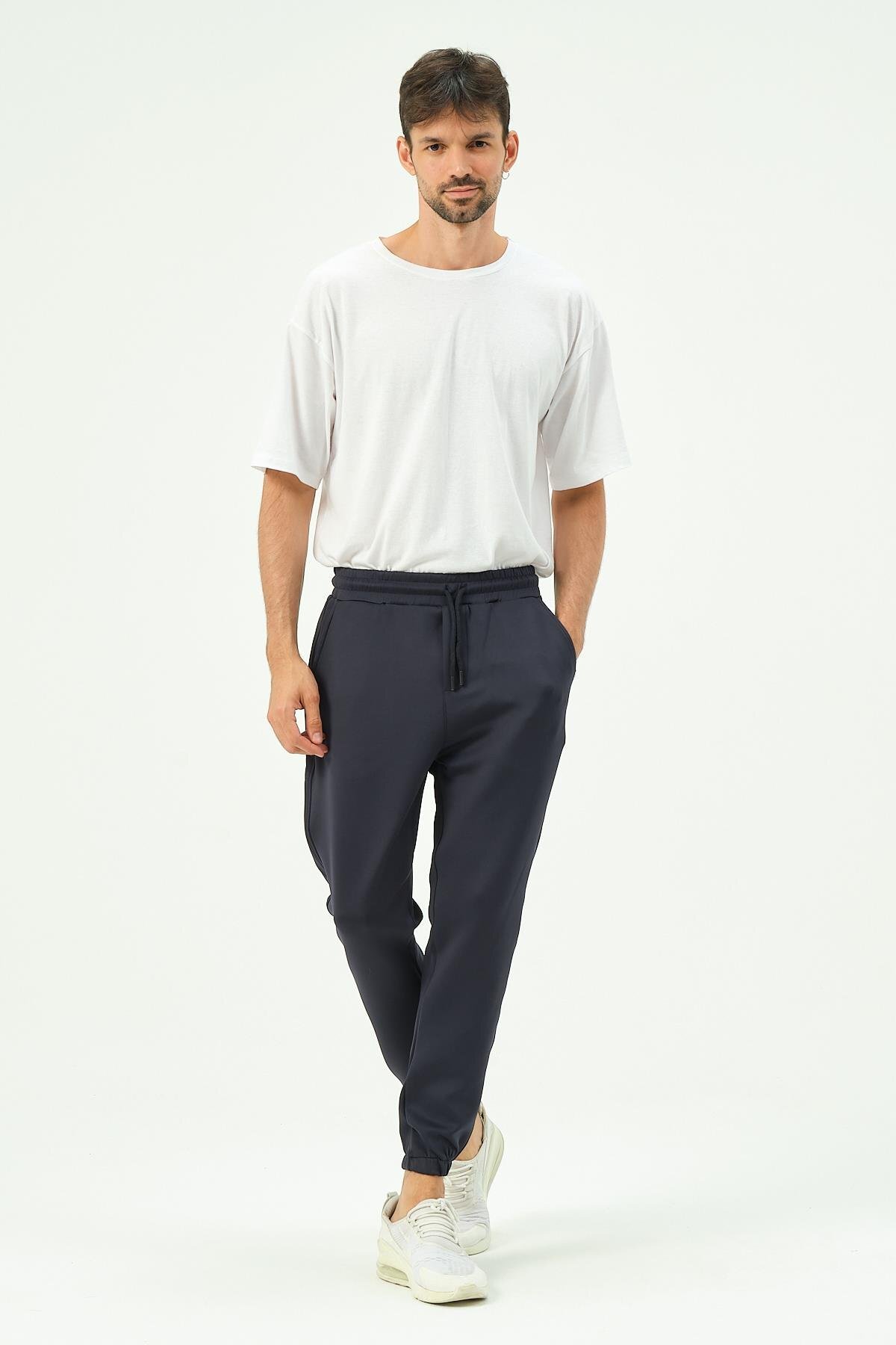 سی اند سیتی شلوار ورزشی مردانه جیب‌دار کشی، مدل ۸۵۳، سرمه‌ای