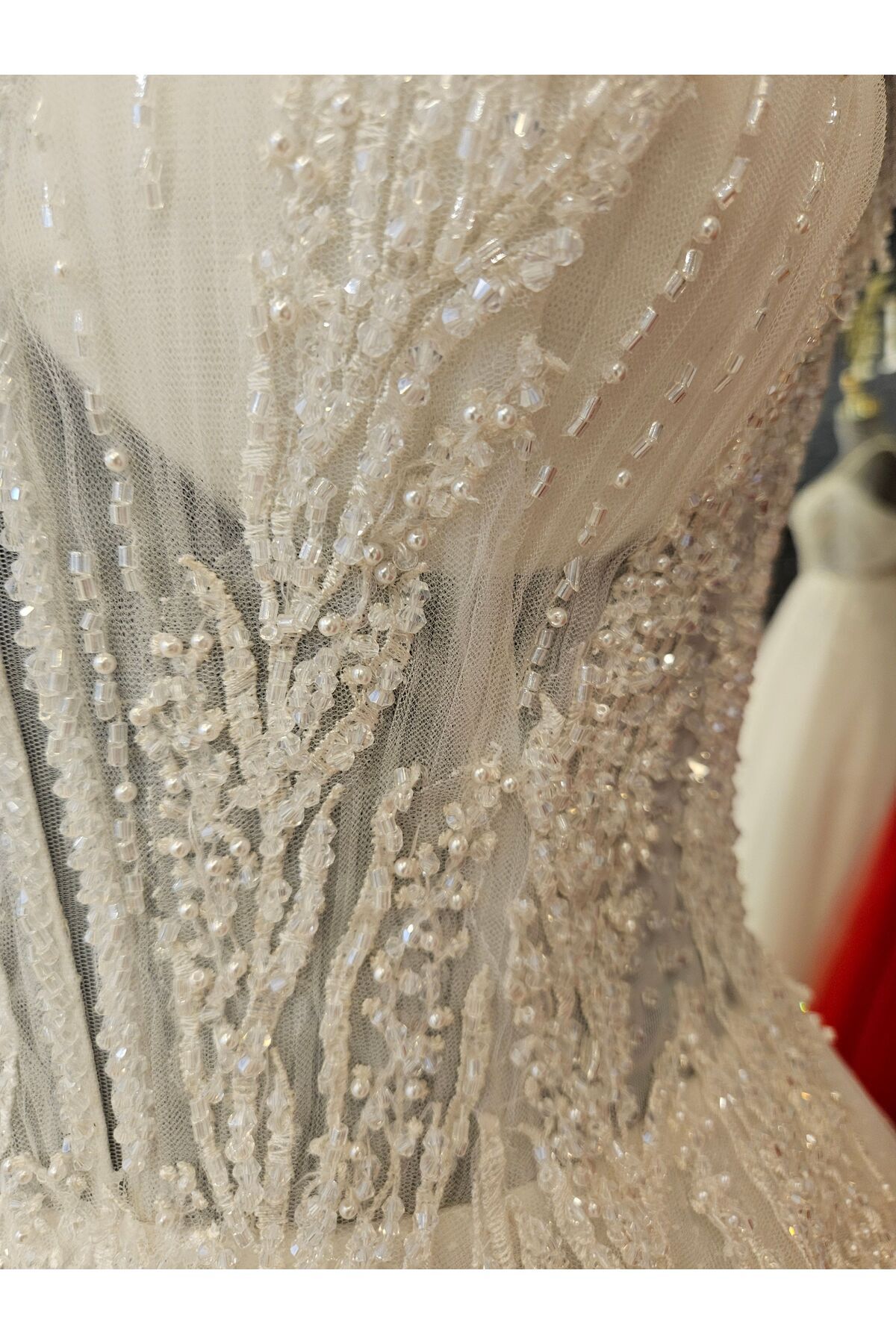 Embroidered pleated A-line wedding dress with sleeve detail