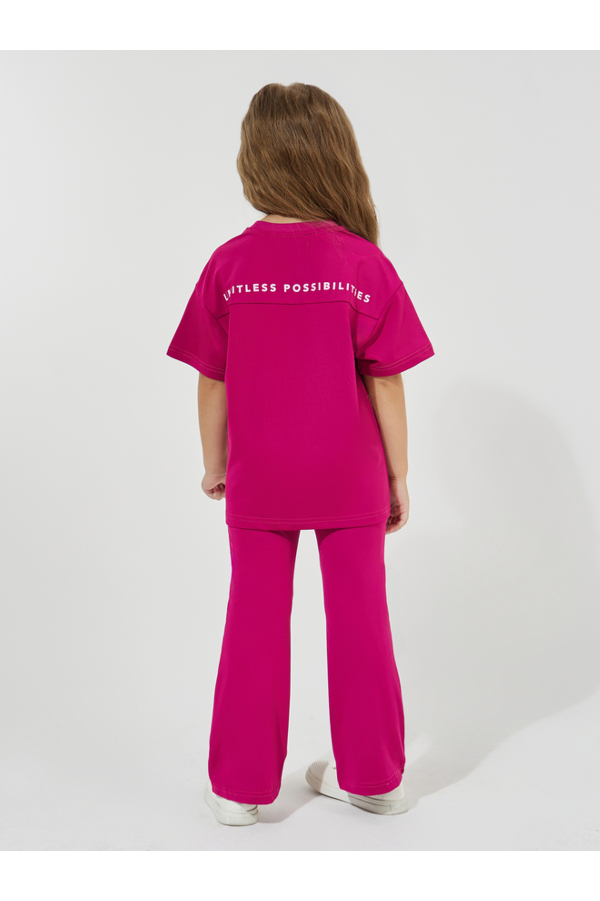 Styli Slogan Print Oversized T-Shirt & Flared Pants Set