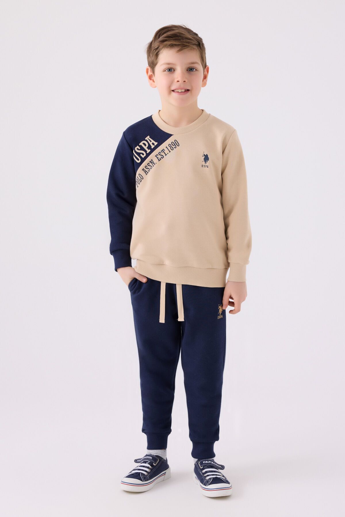 ست لباس ورزشی کرم پسرانه U.S. Polo Assn.